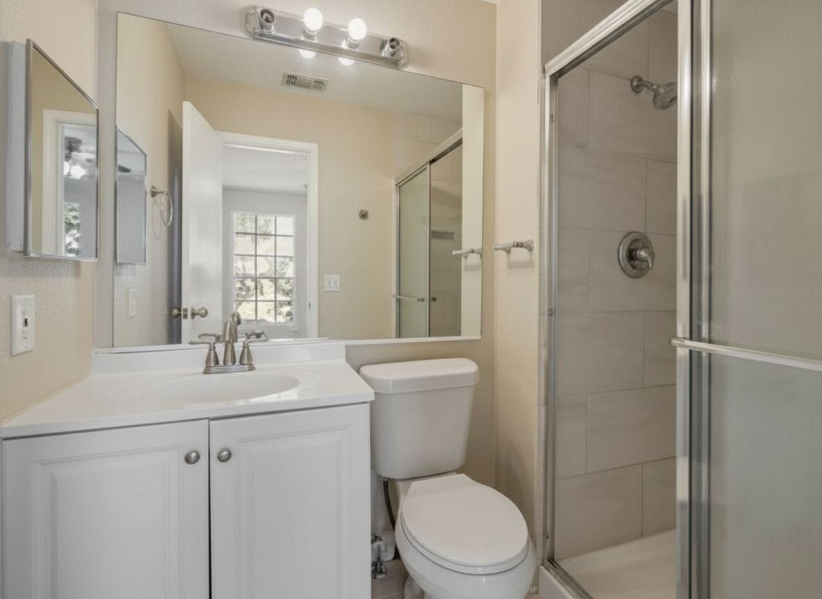 4522 Alamo Avenue, Sugar Land, TX 77479 Full bathroom with vanity and walk-in shower.