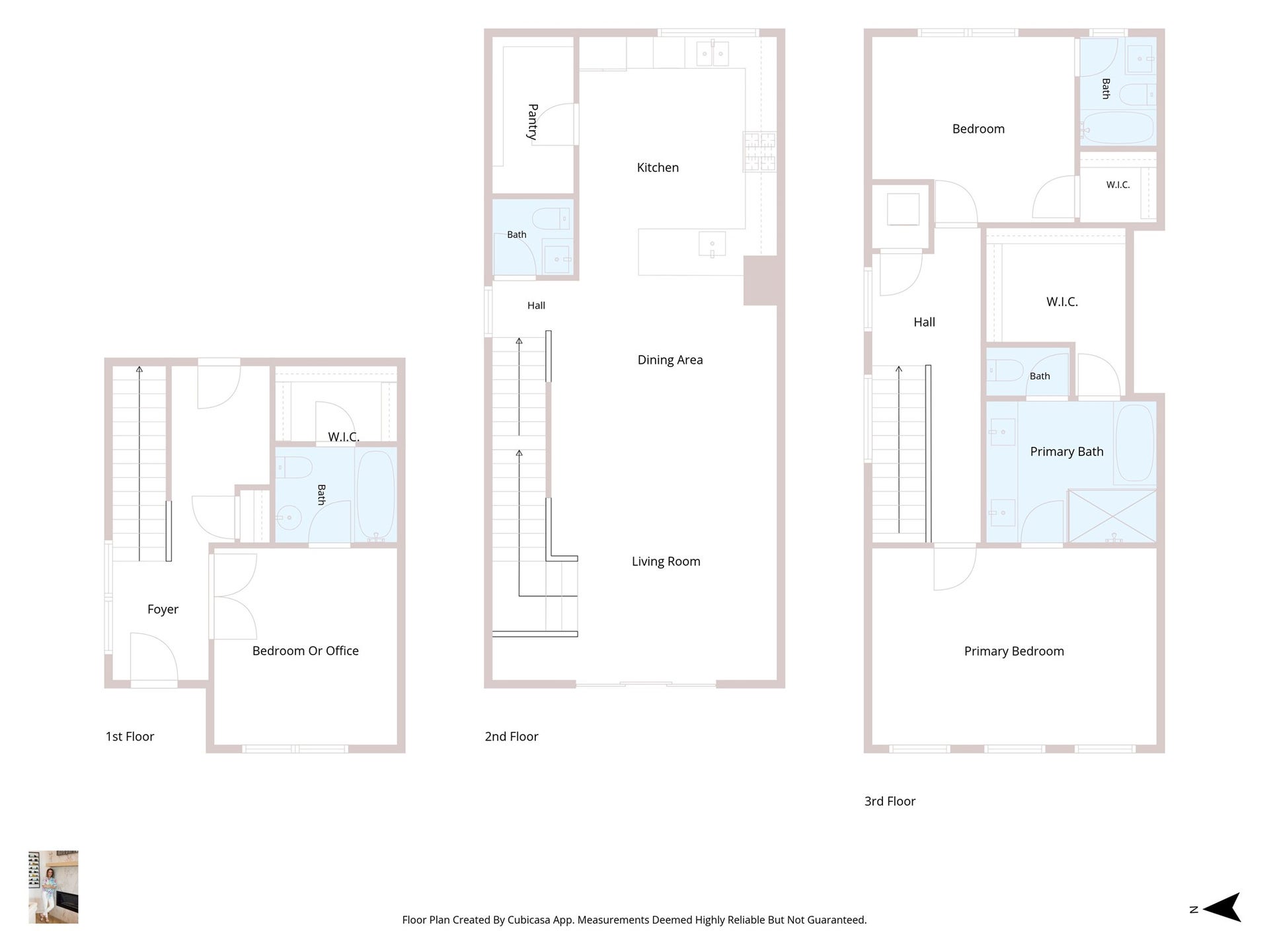 This multi-level home features a spacious living and dining area on the second floor, a modern kitchen with a pantry, and a versatile first-floor bedroom or office. The third floor offers a primary bedroom with a walk-in closet and an en-suite bath, plus an additional bedroom with its own bath.