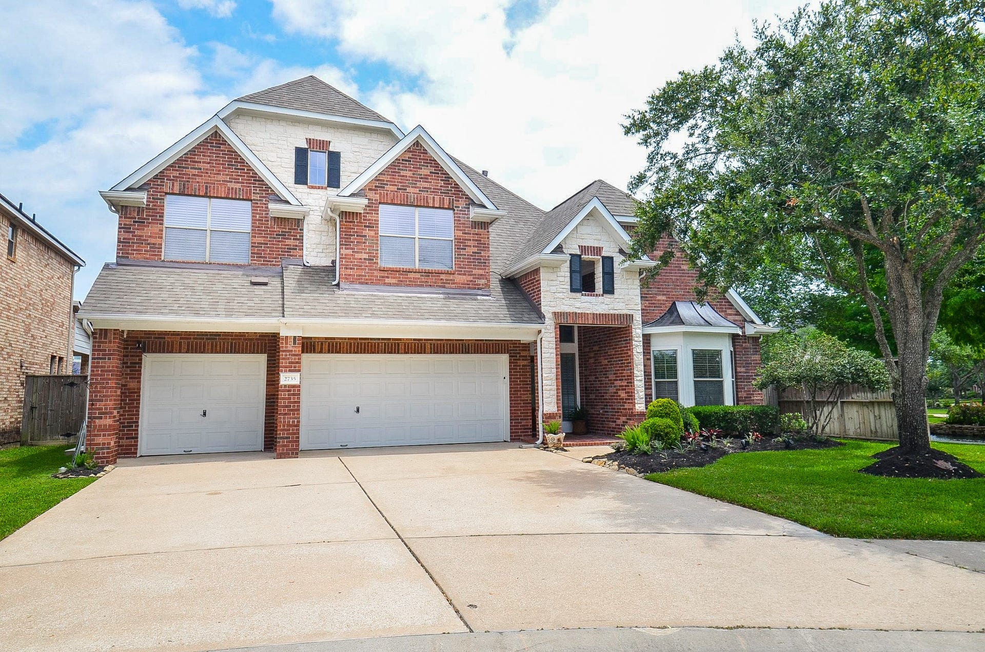 2735 Driftwood Drive, Manvel, TX 77578 Beautiful Brick and Stone elevation