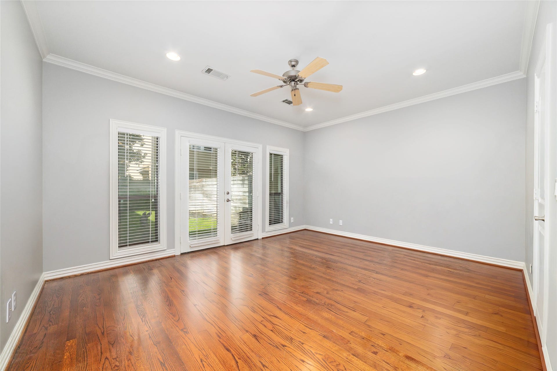 Spacious downstairs bedroom with access to backyard