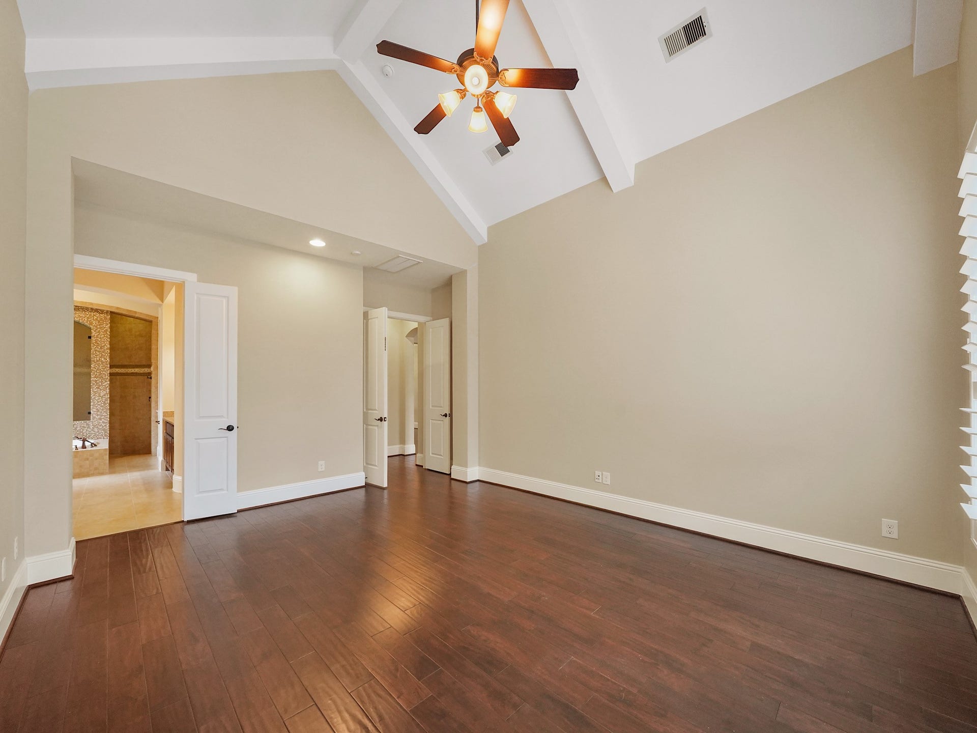 27710 Guthrie Ridge Lane, Katy, TX 77494 From the opposite side, the primary suite unfolds as a true retreatquiet, open, and intentionally set apart from the homes daily pace.