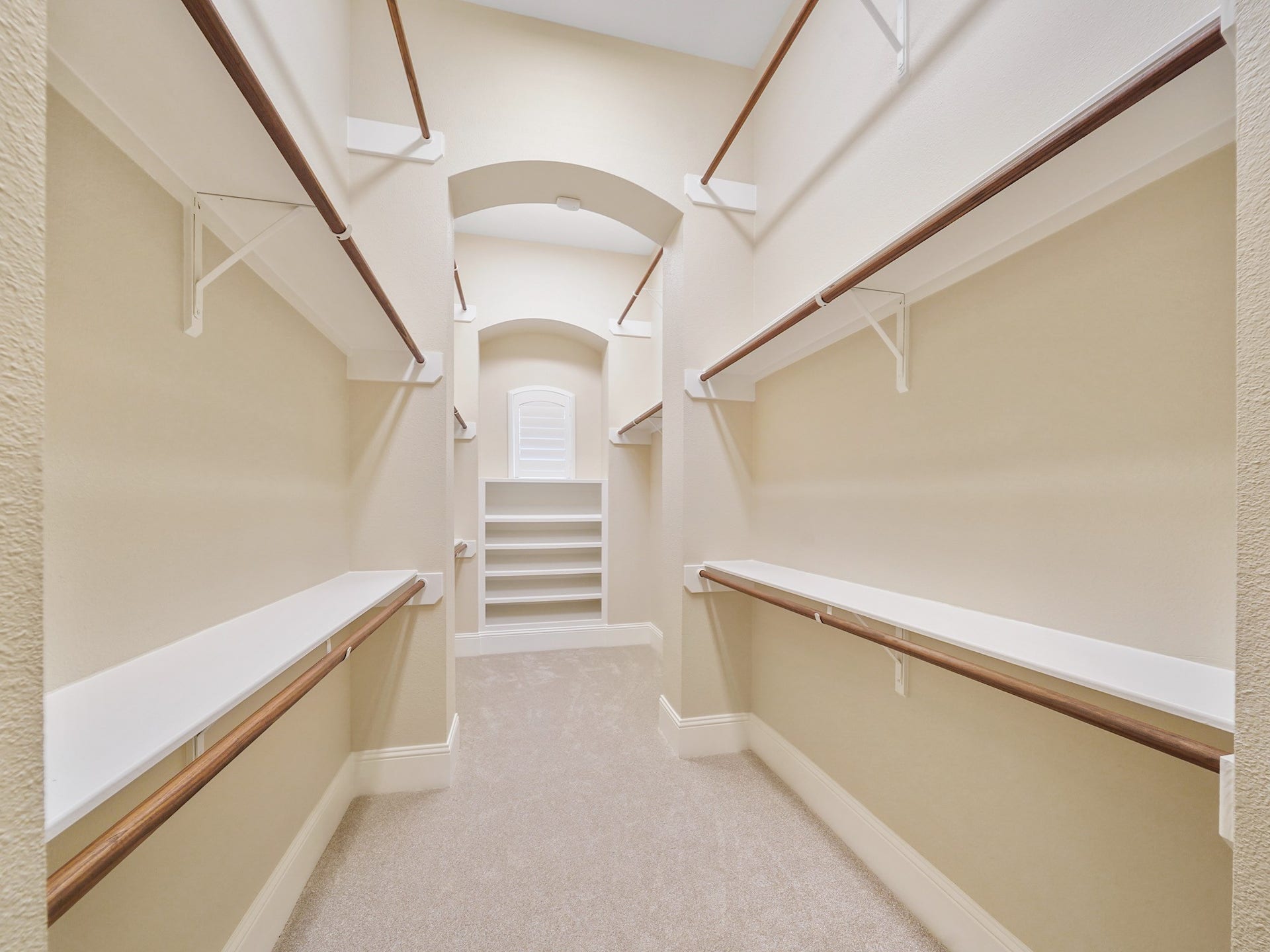 27710 Guthrie Ridge Lane, Katy, TX 77494 An expansive walk-in closet with built-in storage keeps the primary suite feeling organized and composed.