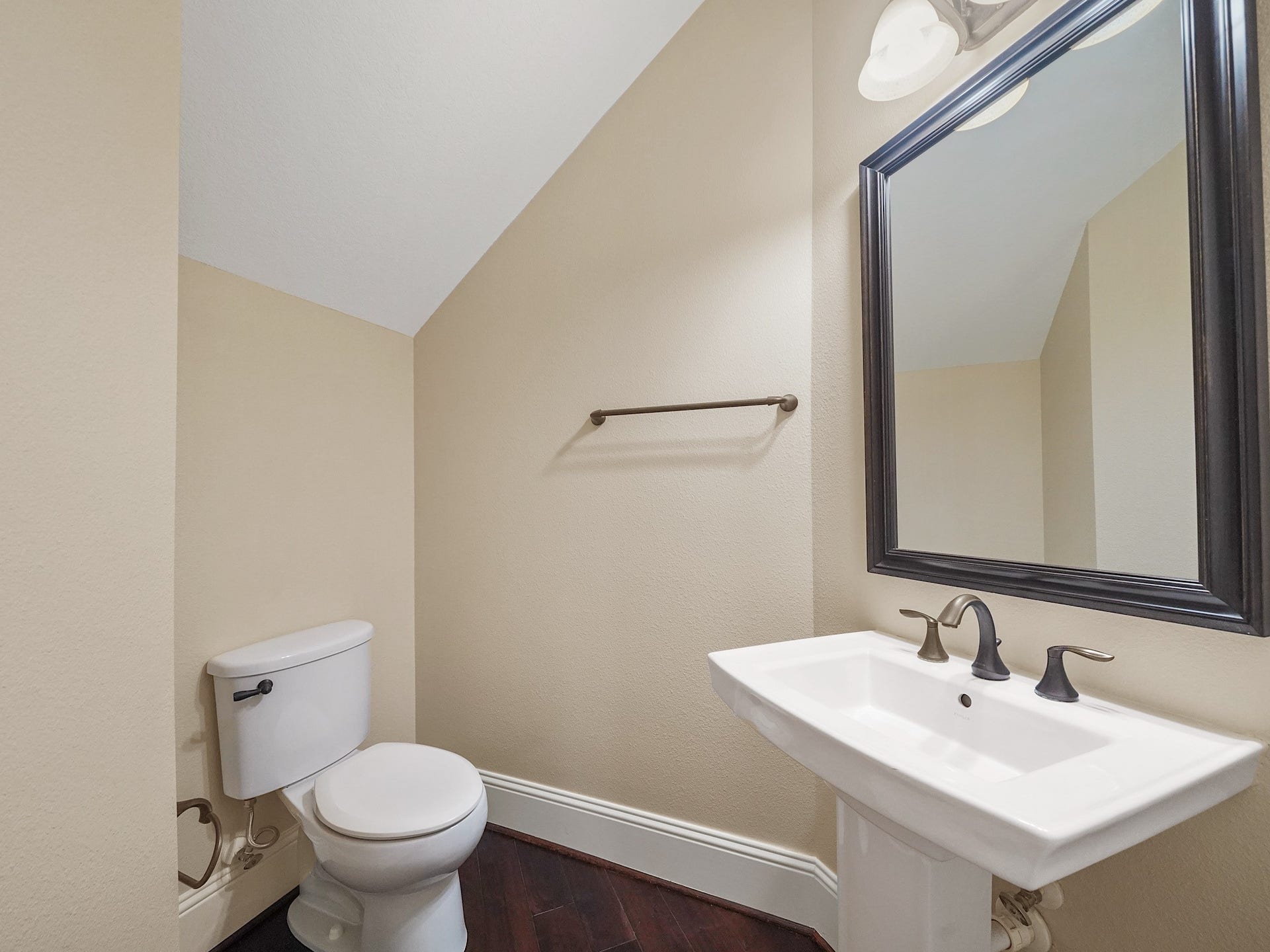 27710 Guthrie Ridge Lane, Katy, TX 77494 A tucked-away powder room adds thoughtful convenience on the first floor.