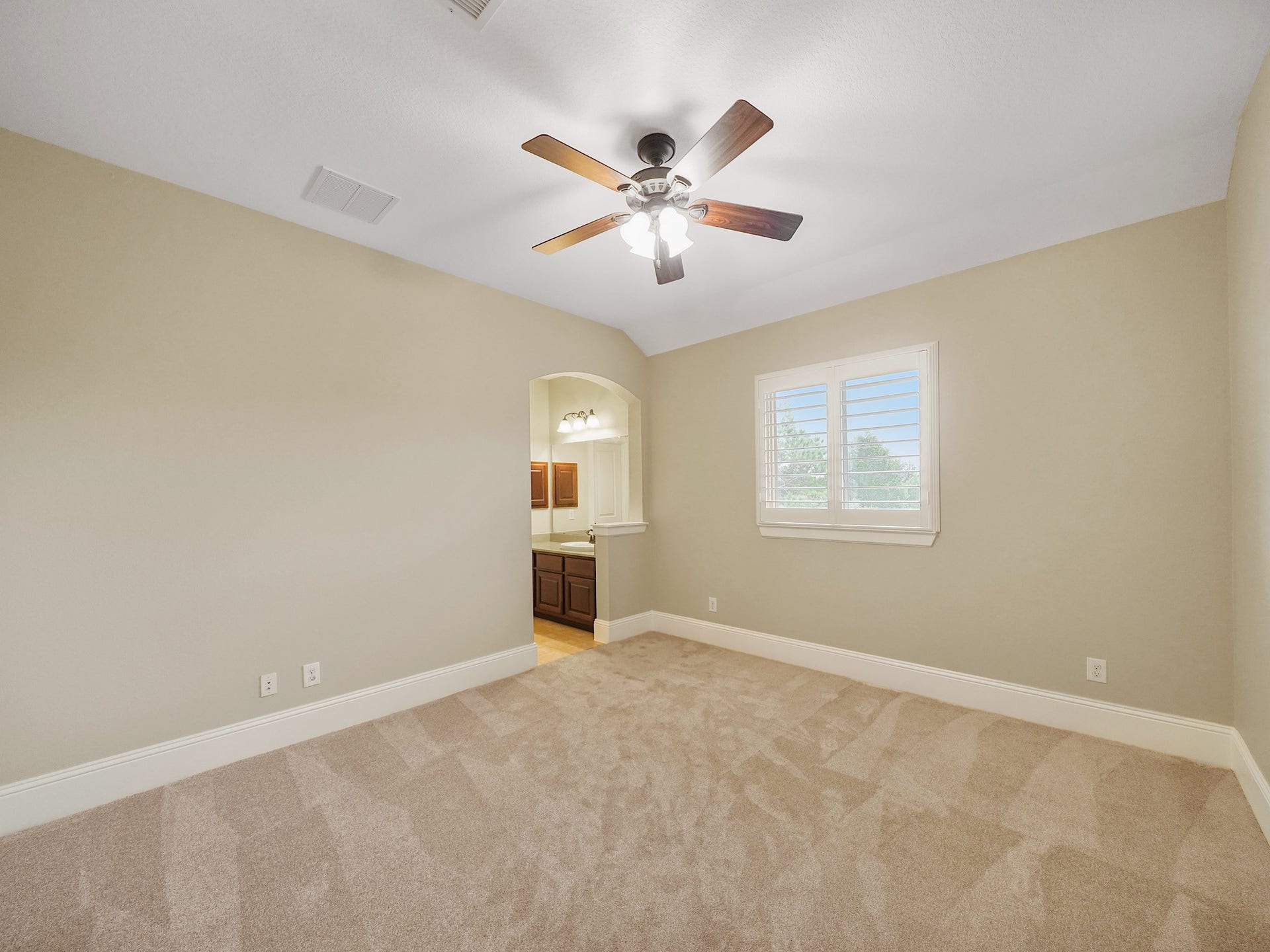 27710 Guthrie Ridge Lane, Katy, TX 77494 Another bright secondary bedroom offers a versatile blank canvas for changing needs.