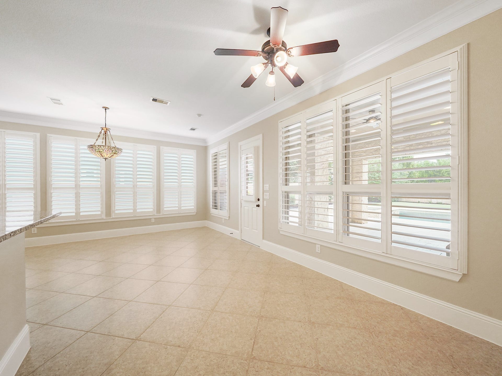 27710 Guthrie Ridge Lane, Katy, TX 77494 Bathed in natural light, the breakfast area is equally inviting as a cozy sunrooman easy place for slow mornings and an afternoon read.