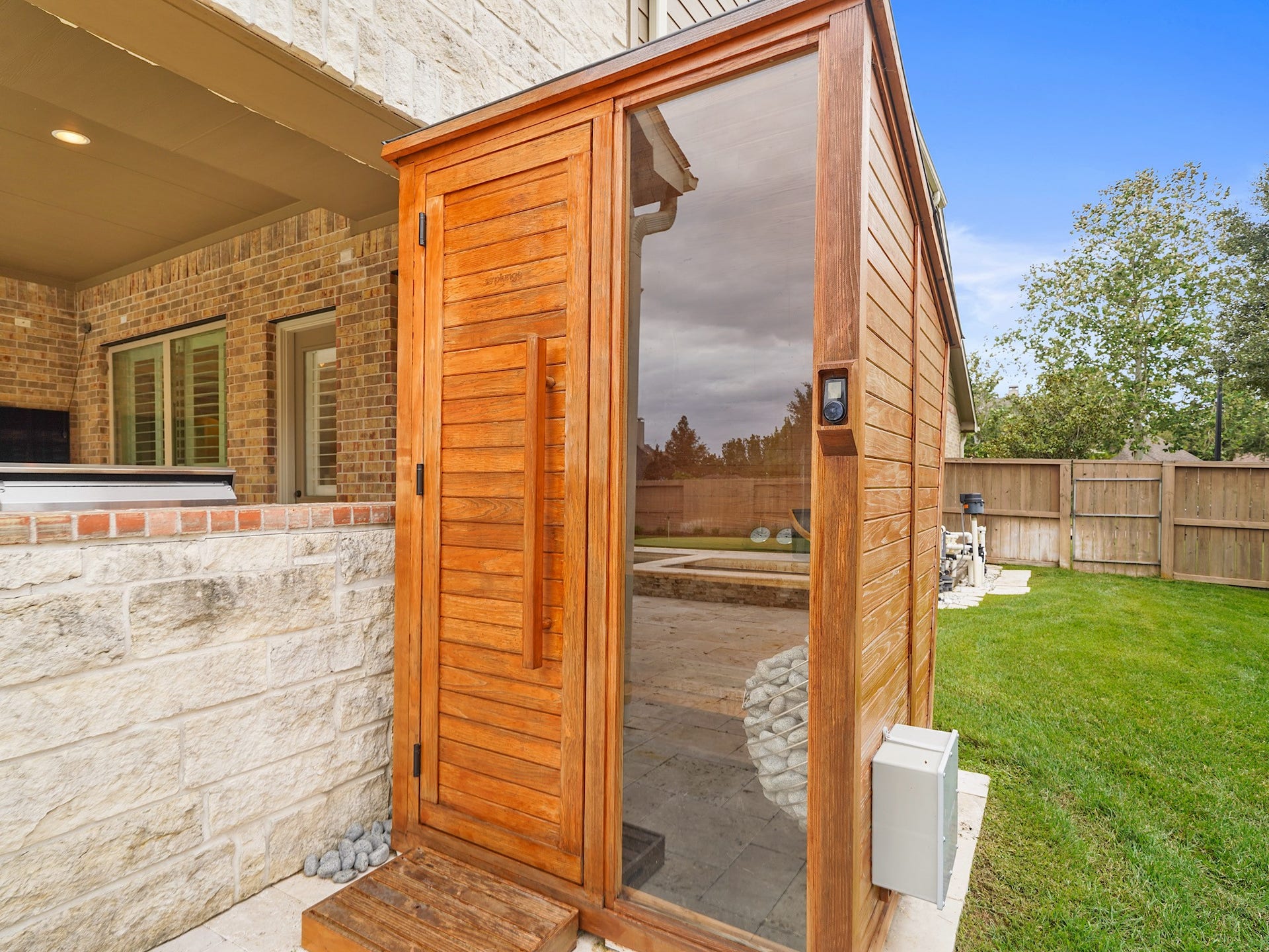 27710 Guthrie Ridge Lane, Katy, TX 77494 A cedar sauna adds a rare wellness amenity to the homes already exceptional outdoor setting.