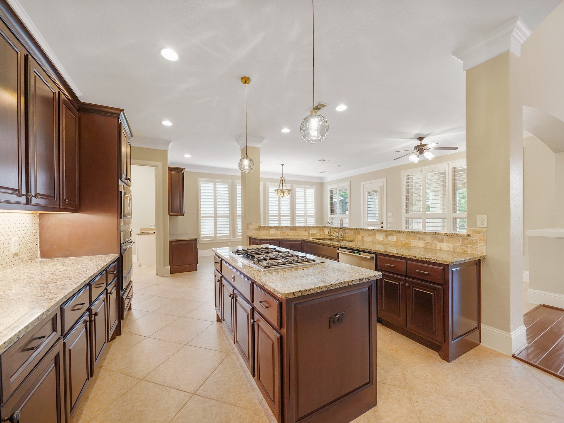27710 Guthrie Ridge Lane, Katy, TX 77494 This additional kitchen angle captures the generous cabinetry and thoughtful layout that make cooking, serving, and gathering feel wonderfully effortless.