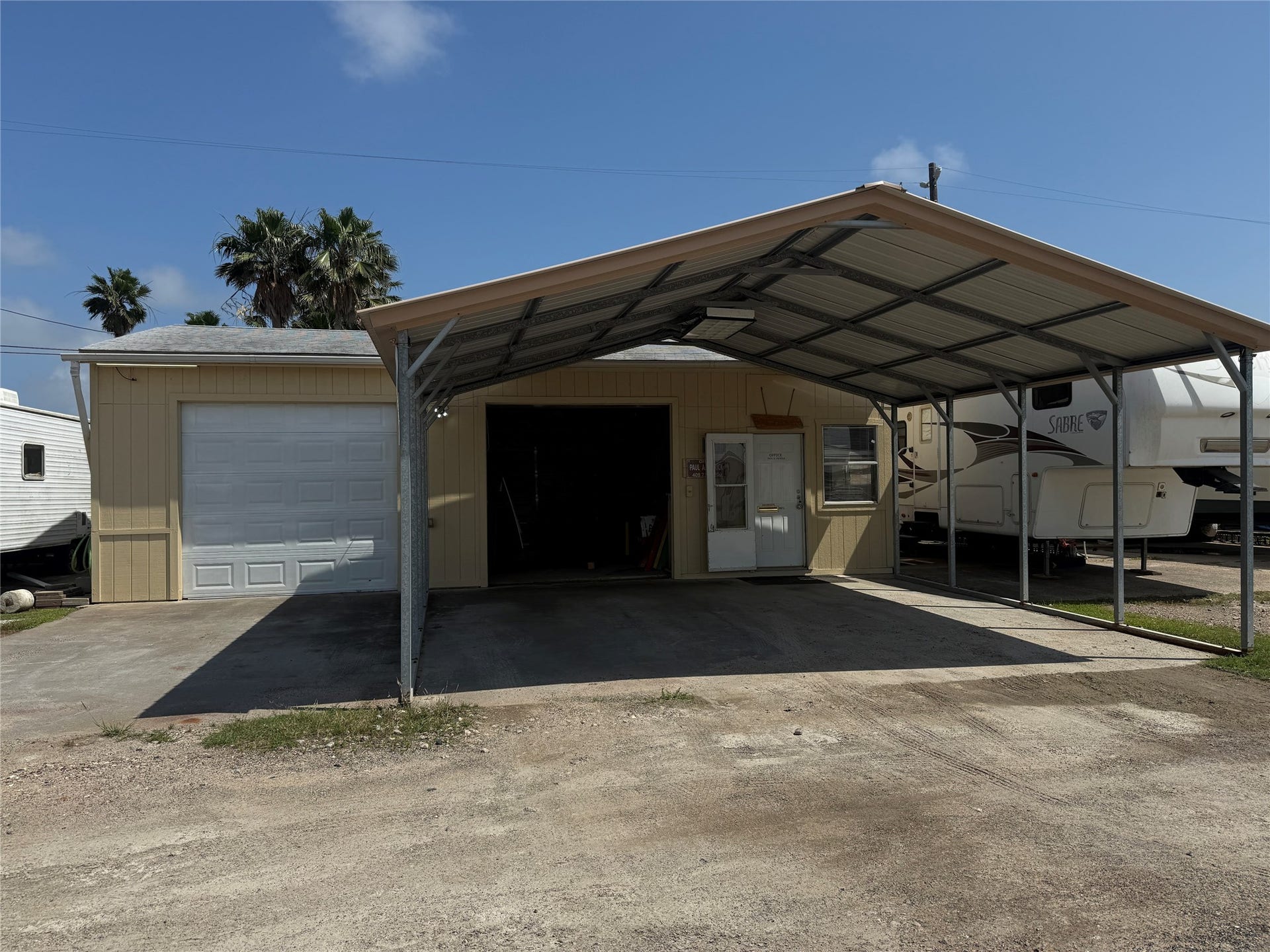 3401 Highway 6, Hitchcock, TX 77563 The 864 sq ft building with covered parking.