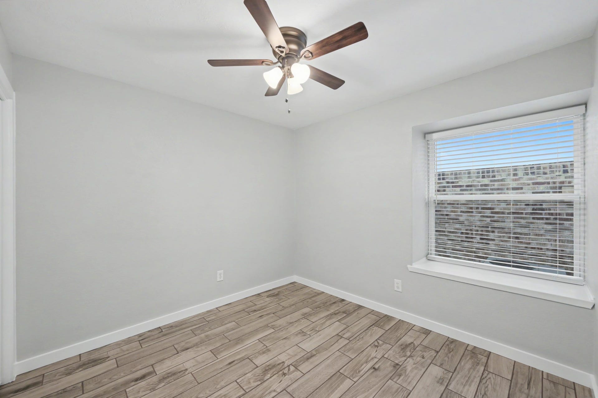 Two more Secondary Bedrooms are located on the opposite side of the home in this split plan.