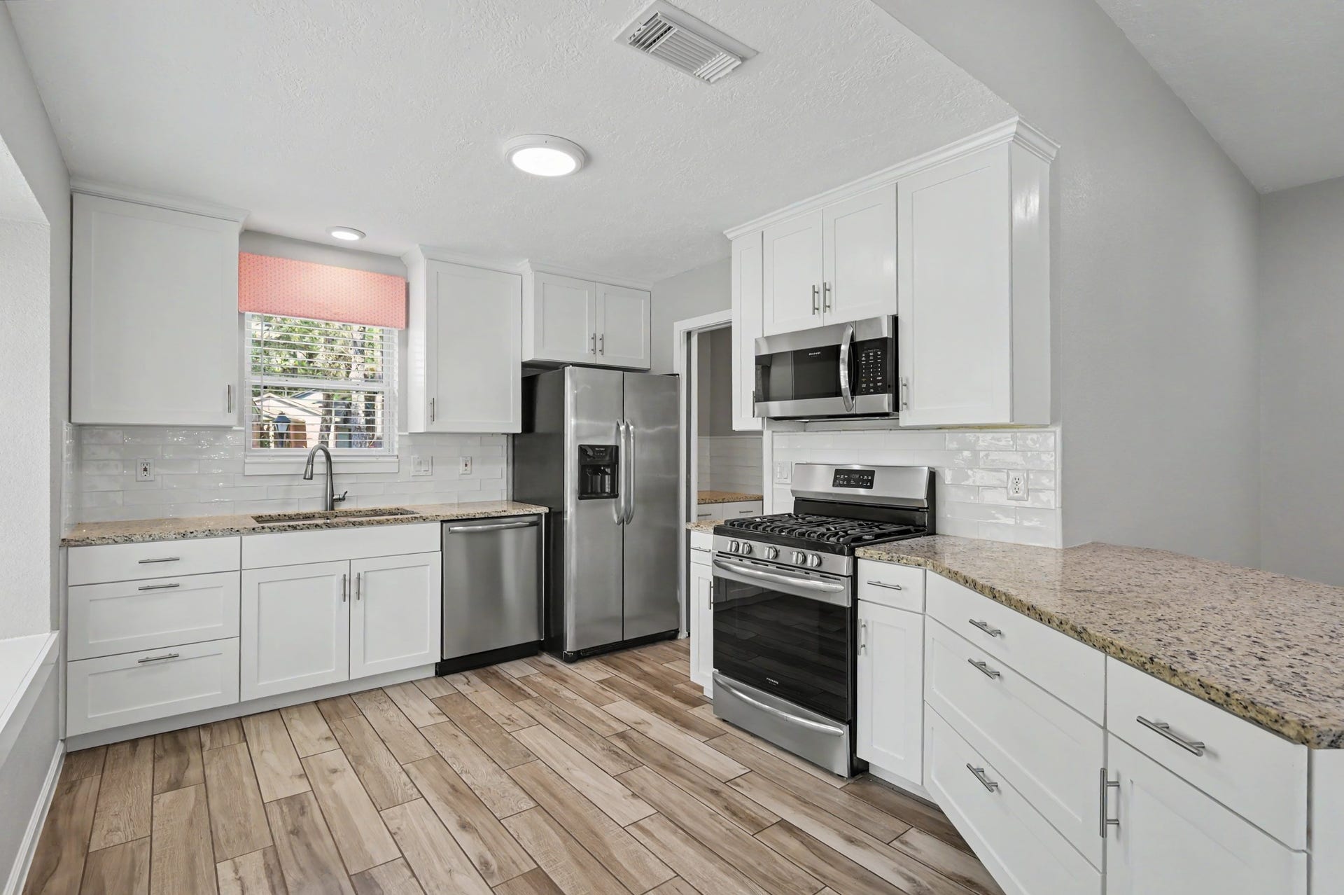 The Kitchen Refrigerator is included along with the Dishwasher, Microwave, and Gas Range.