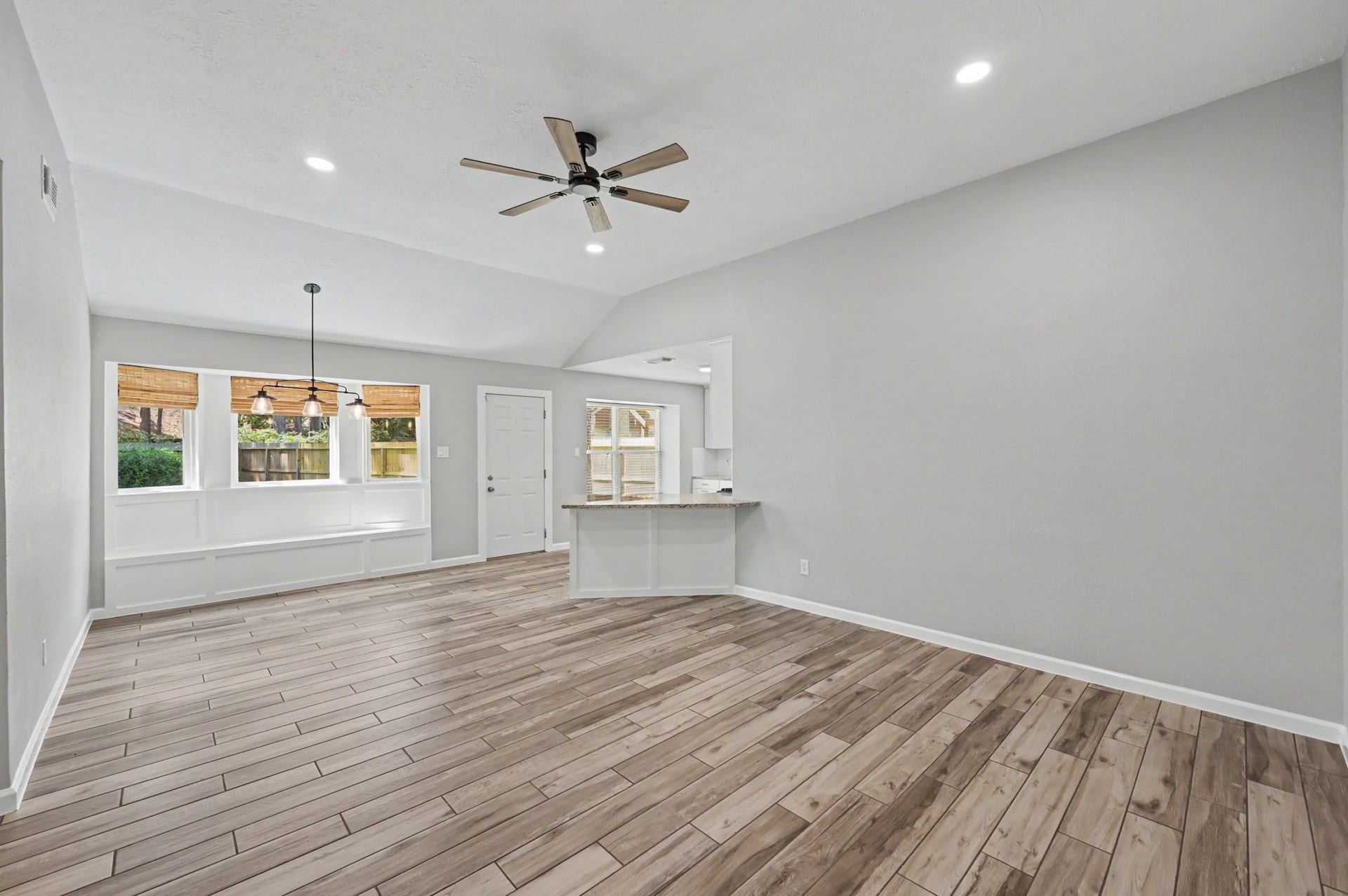 The Family room opens into the Dining space and the Kitchen.