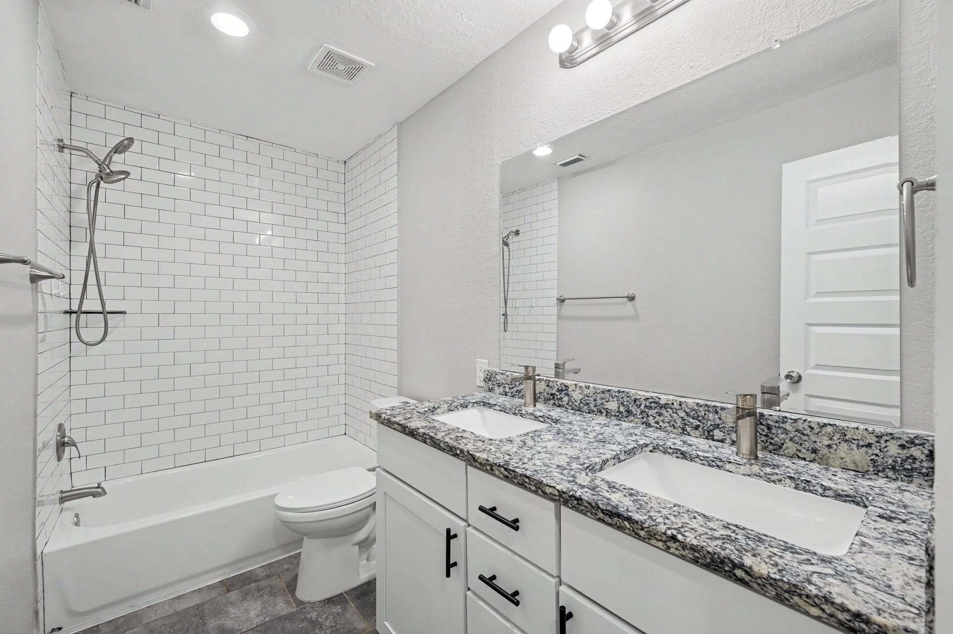 There is a Secondary Bathroom conveniently located by the bedrooms and easy access to guests.