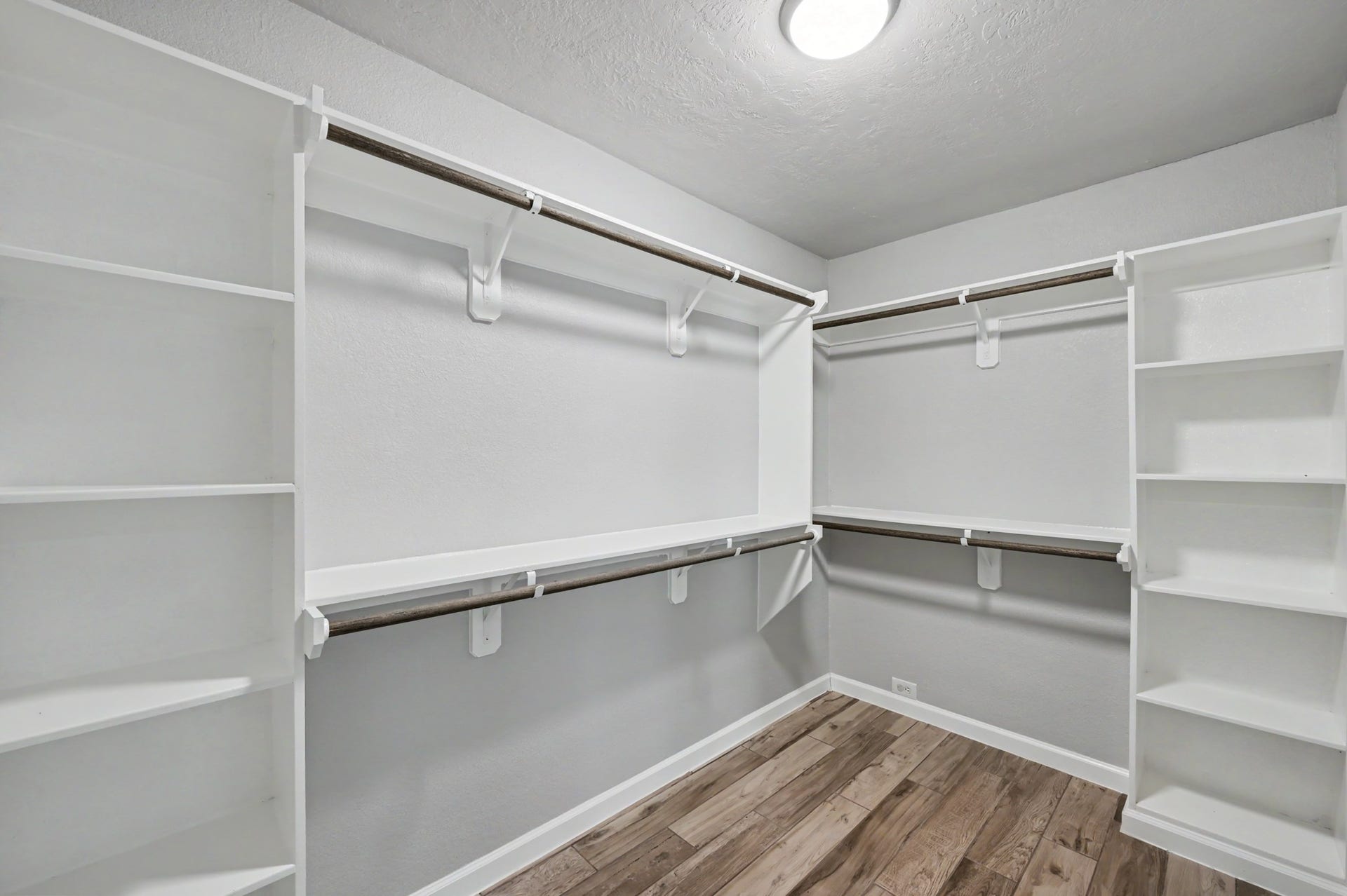 The expanded walk-in closet provides great space for storage.