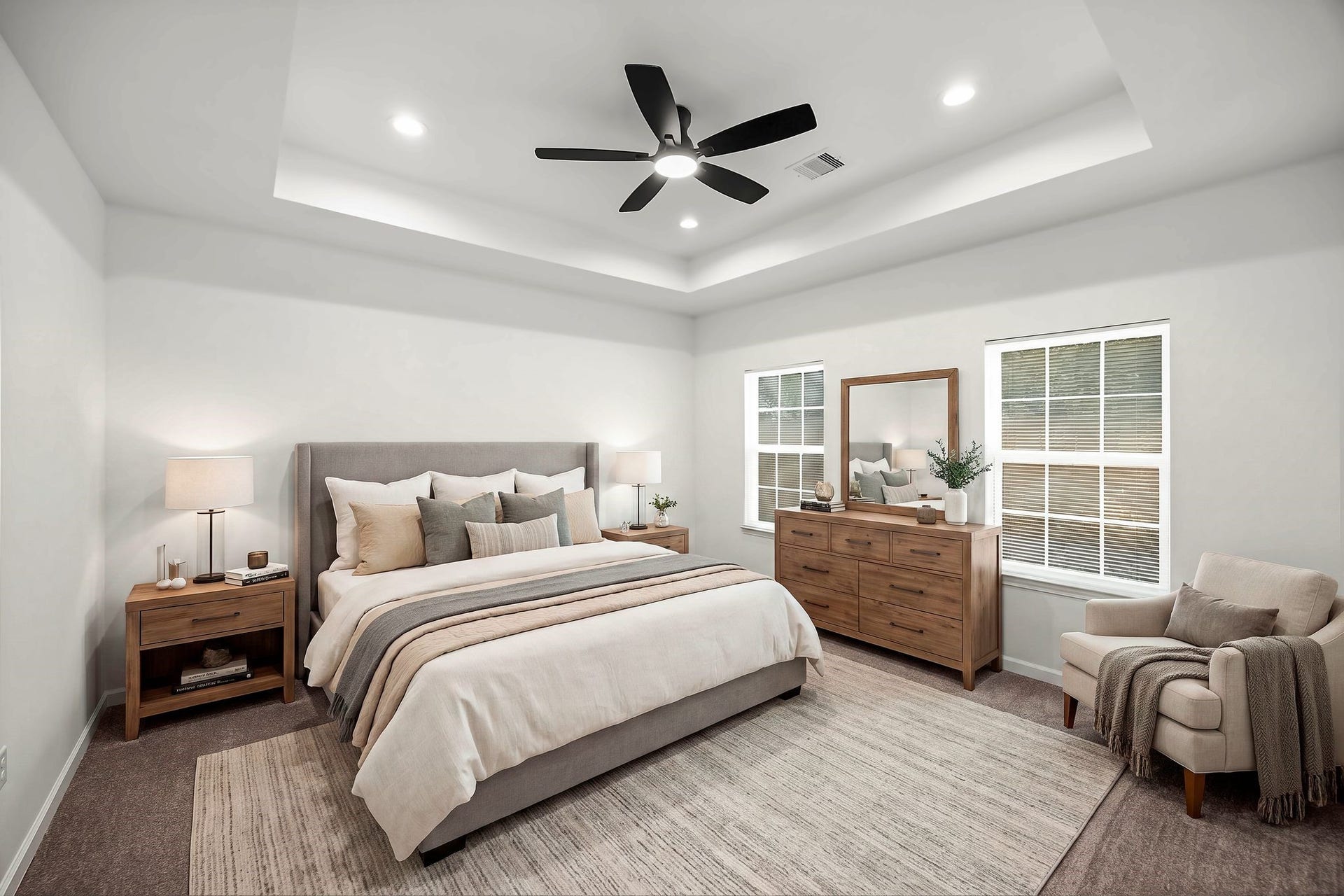 10426 Royal Oaks Drive, Houston, TX 77016 Primary bedroom with coffered ceiling, recessed lighting, ceiling fan, and large windows providing abundant natural light
