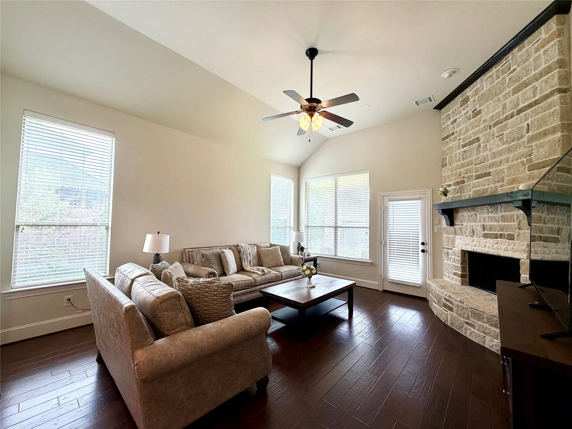 175 Oarwood Place, Spring, TX 77389 Living area with cozy fireplace