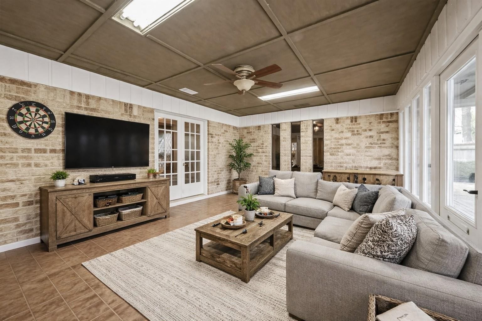 410 Riverside Drive, Alvin, TX 77511 Virtually staged with furniture to show one of the ideas of what you can do in this sunroom/bonus room.