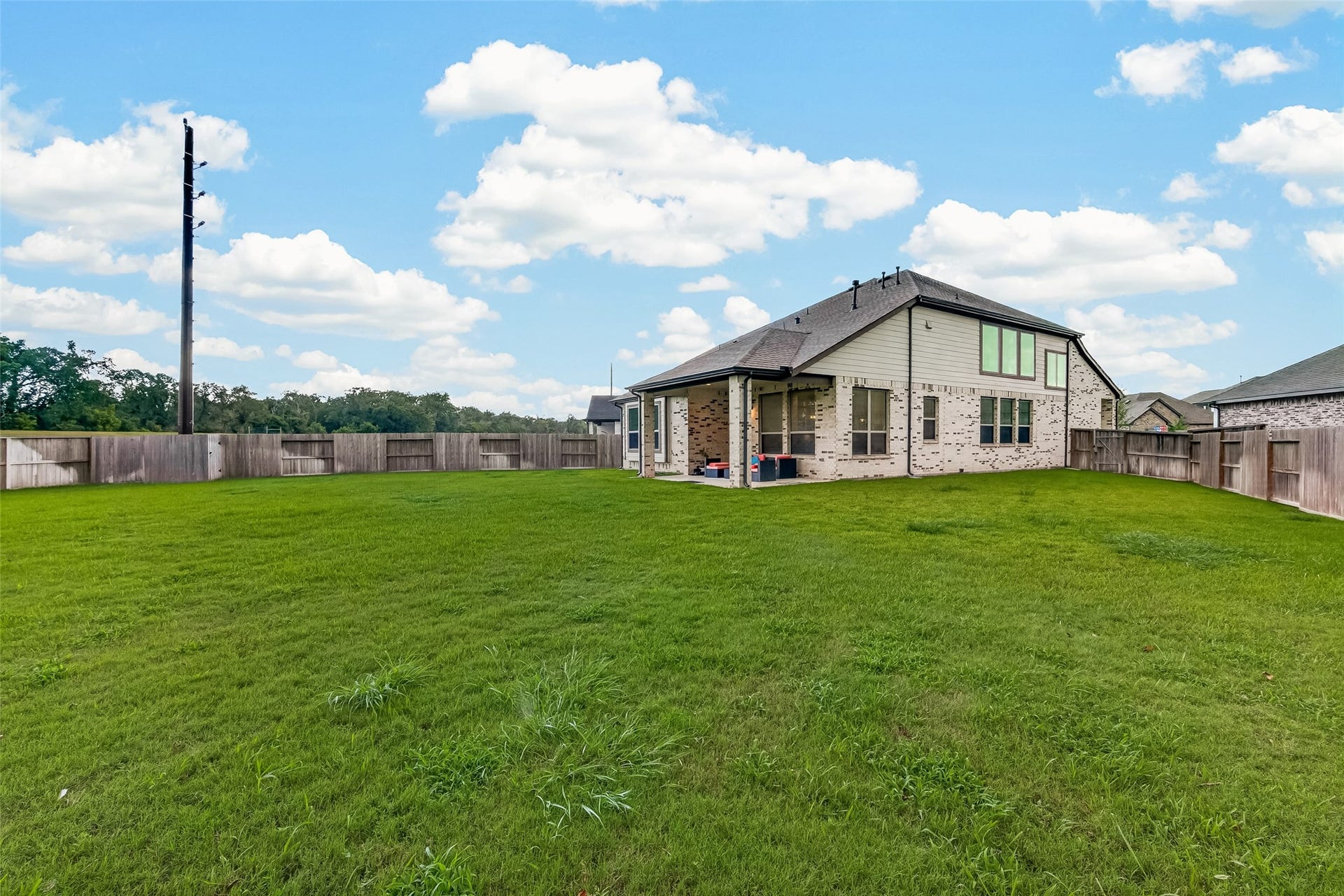 10730 Hidden Rock Drive, Missouri City, TX 77459 For the golf enthusiast, this property offers the perfect canvas to install your own private putting green. Beyond the backyard, you will enjoy the added benefit of privacy with no back neighbors, ensuring a peaceful atmosphere while you practice your short game or relax after a day on the course.