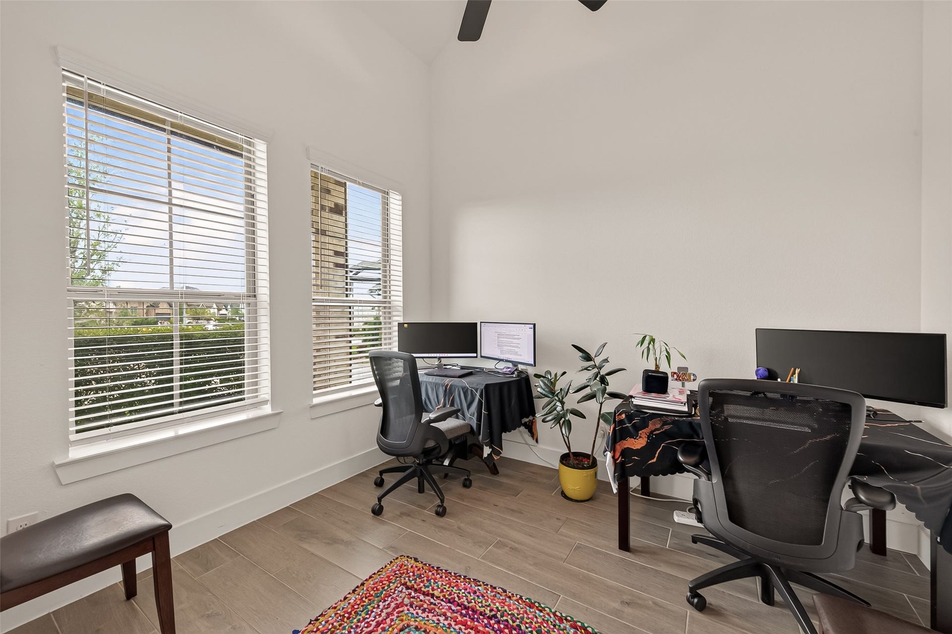 10730 Hidden Rock Drive, Missouri City, TX 77459 This spacious office, located to the left of the front entrance, features large windows overlooking the street, making it the perfect workspace for those who work from home.
