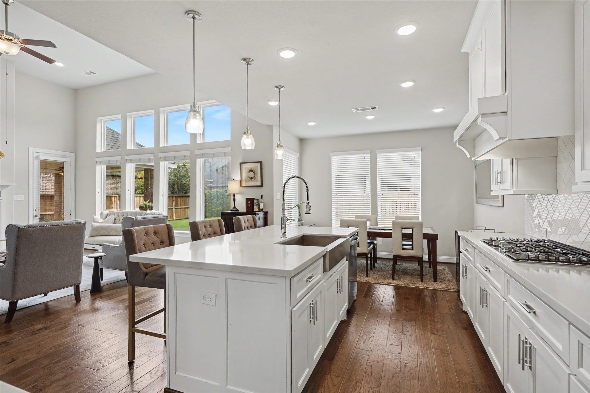 28216 Regal Wood Court, Spring, TX 77386 Open kitchen with central island overlooking the great room.