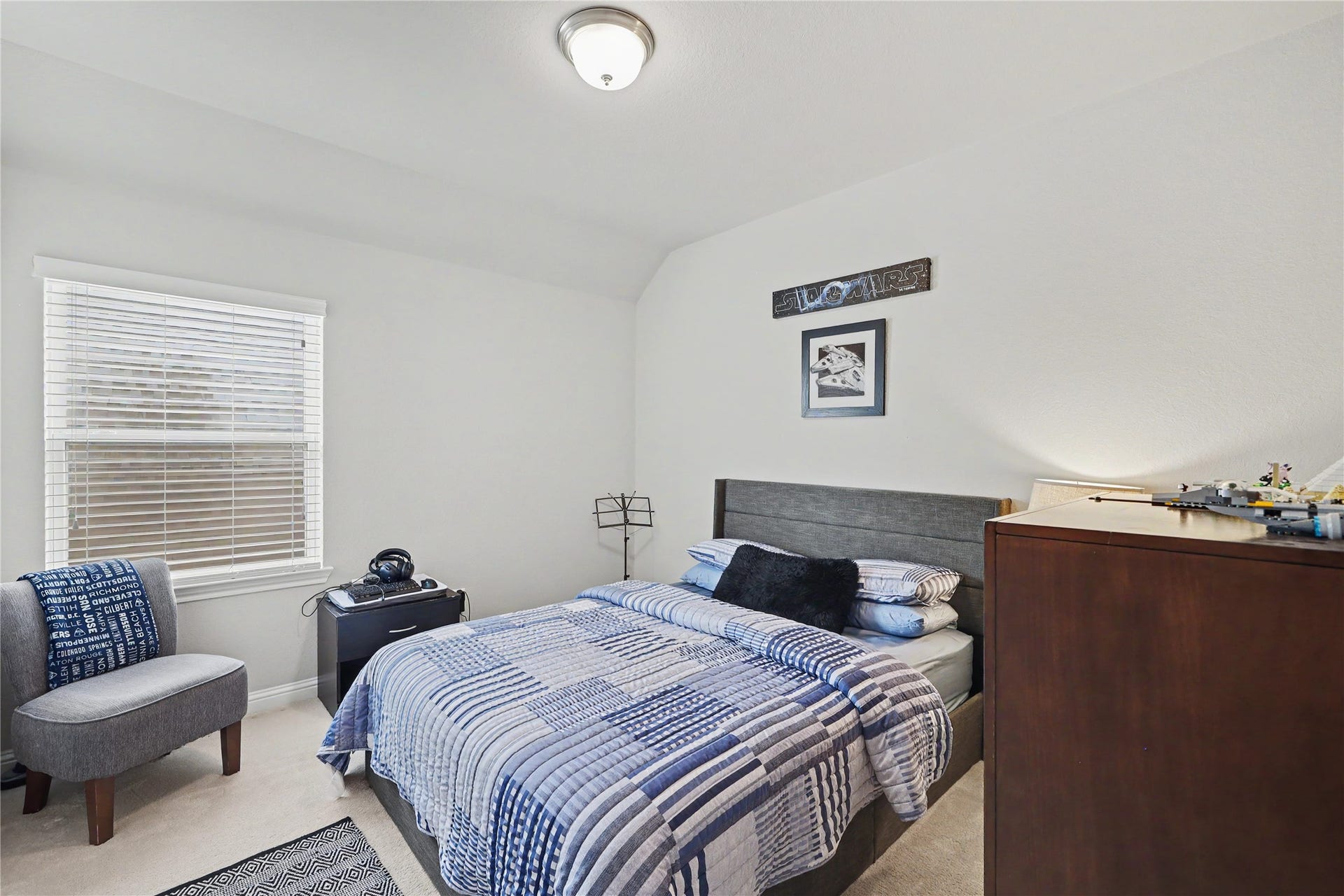 28216 Regal Wood Court, Spring, TX 77386 Secondary bedroom with ceiling fan, natural light, and flexible furniture arrangement.