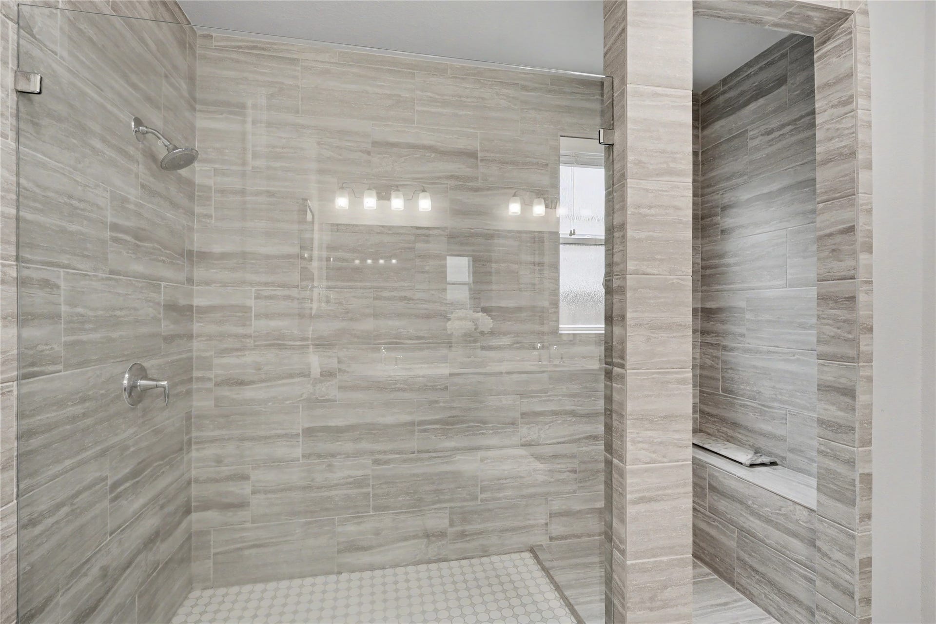 28216 Regal Wood Court, Spring, TX 77386 Primary bathroom featuring a spacious walk-in shower with tile surround and glass enclosure.