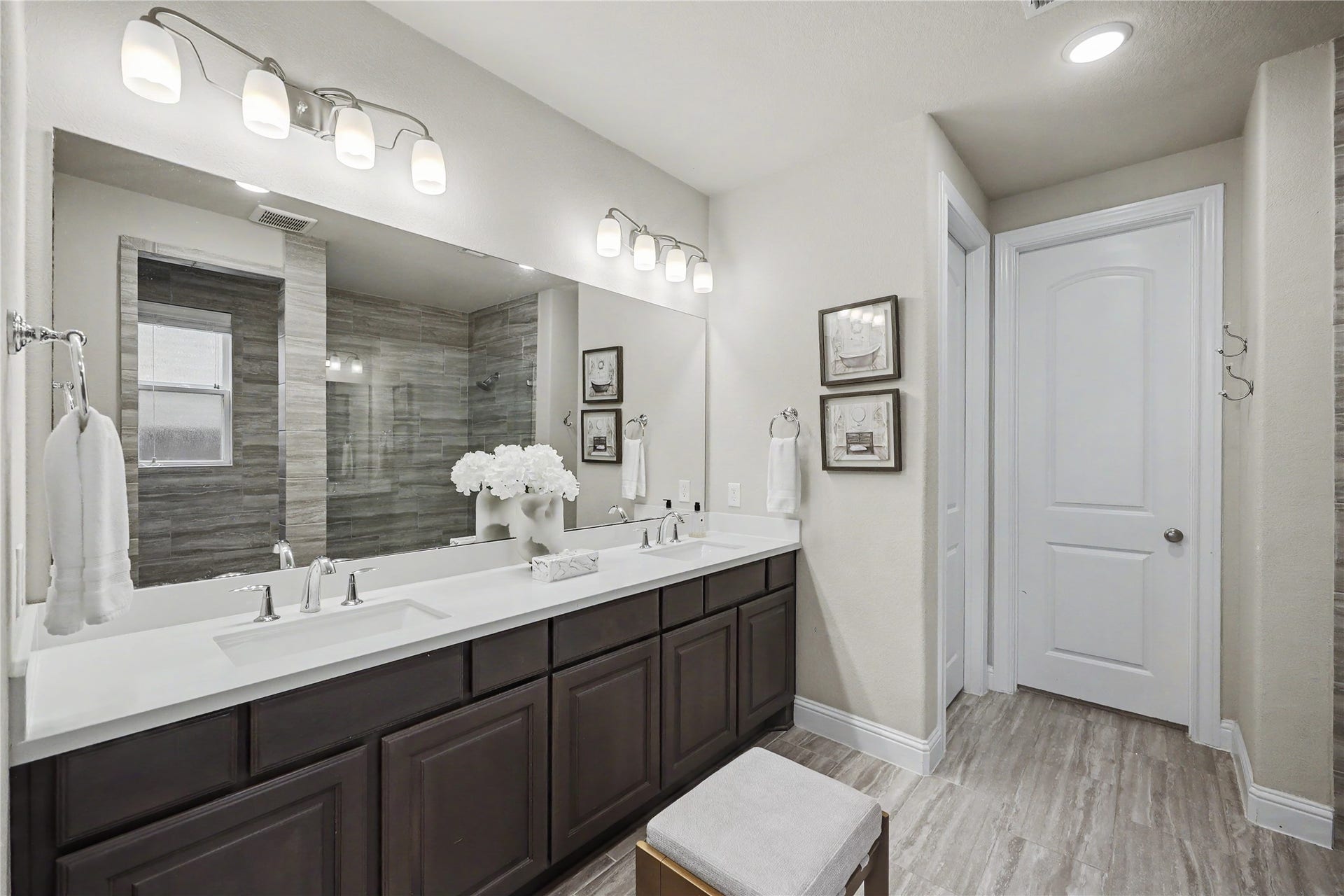 28216 Regal Wood Court, Spring, TX 77386 Additional view of the primary bathroom with extended dual-sink vanity and ample cabinetry.