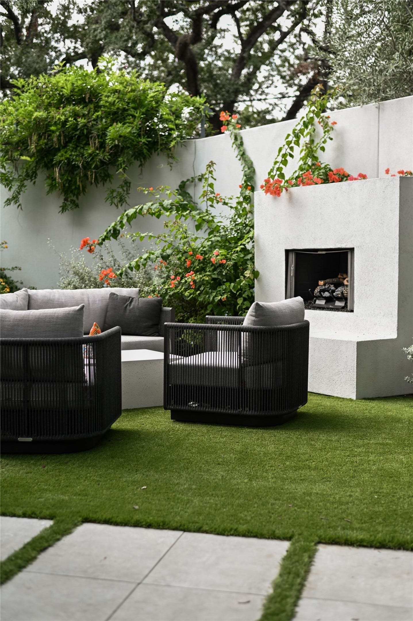 Tucked away in your front yard, this private outdoor living room is something you do not find often.