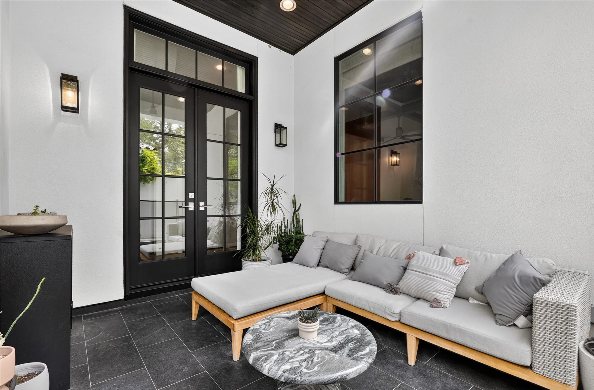 Private, covered patio can be enjoyed in any weather.