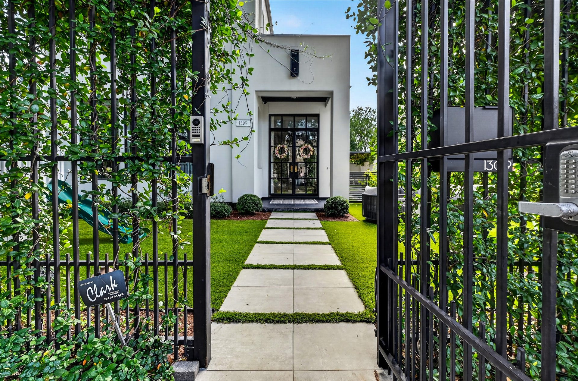 Enter through the gates to this one of a kind property.