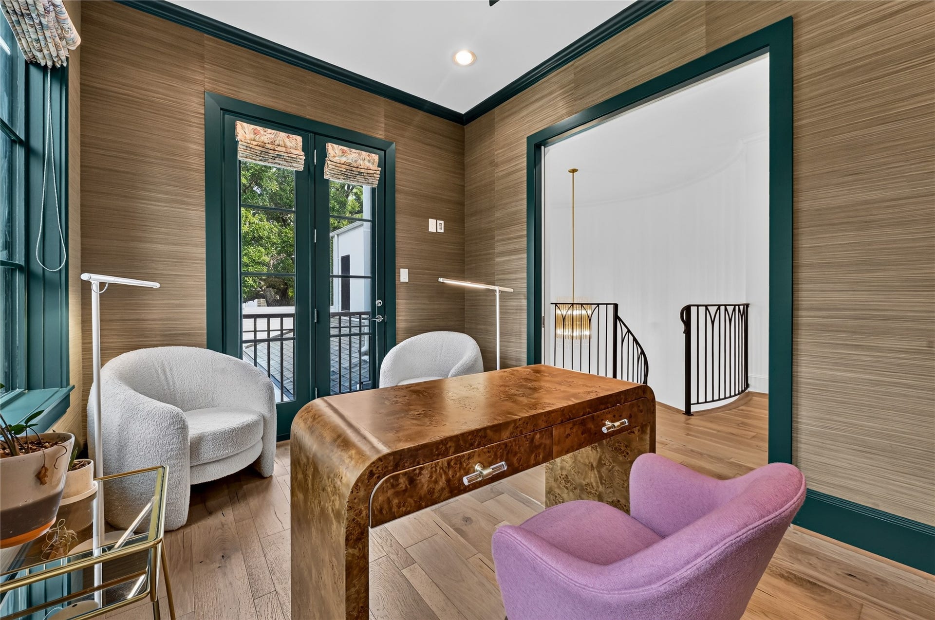 Home Office features custom wall paper, paint & overlooks your back yard & pool.
