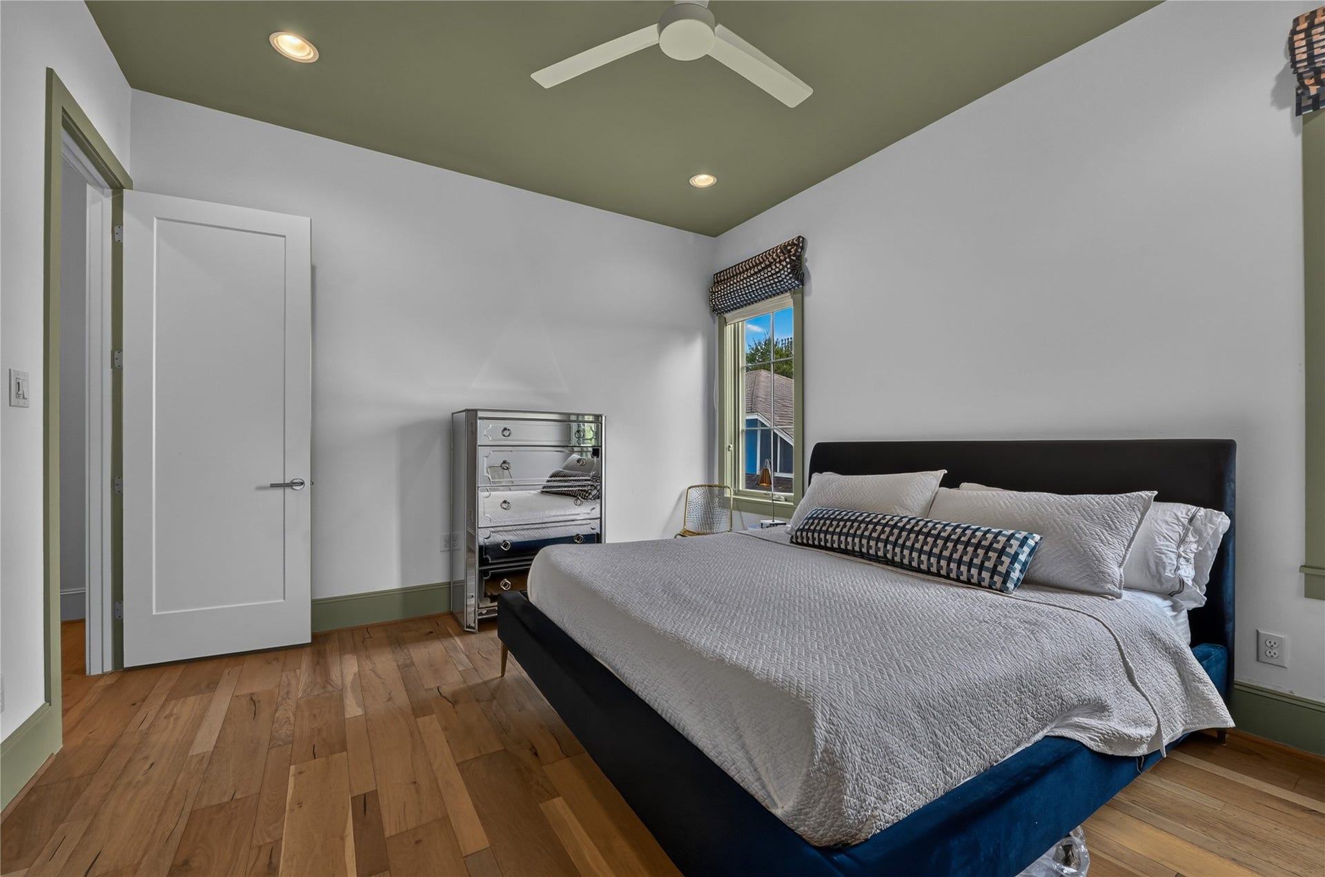 Secondary bedroom has elegant paint.