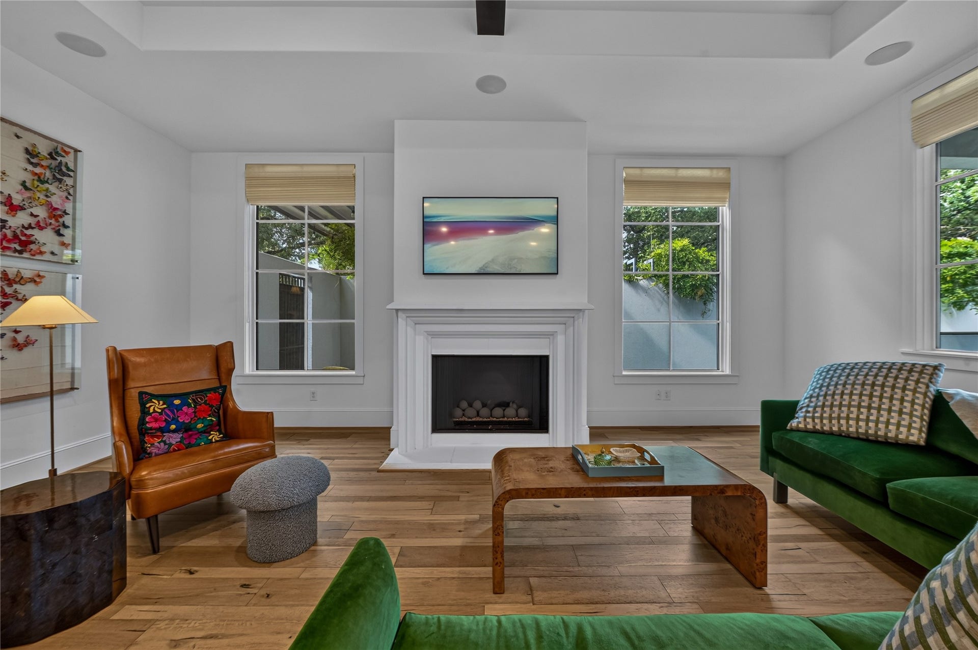 Family room features great angles of your back yard & fire place for those cozy nights.