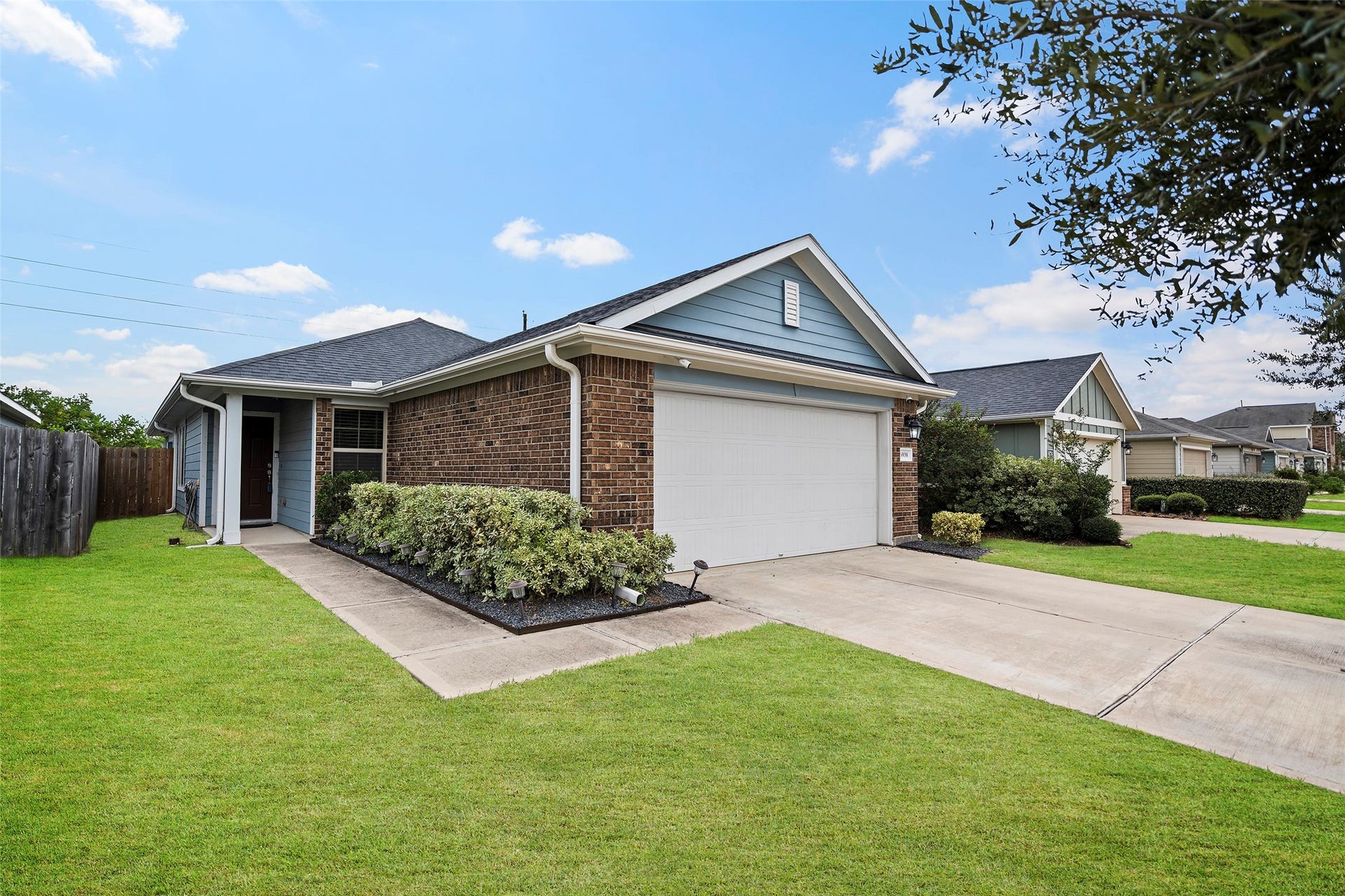 6938 Scarlet Sagebrush Street, Katy, TX 77449 The grass has been edited to show the potential of the house