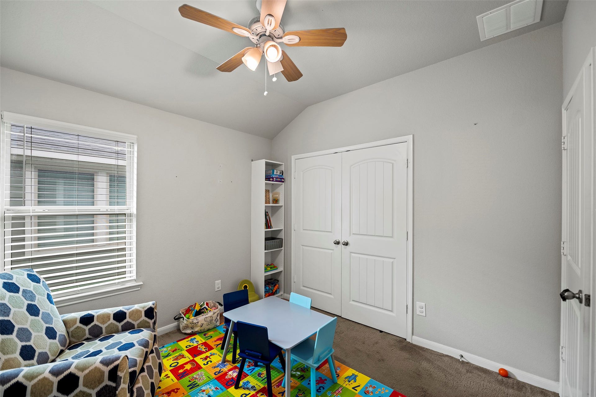 6938 Scarlet Sagebrush Street, Katy, TX 77449 Bedroom 2, currently used as a game room.