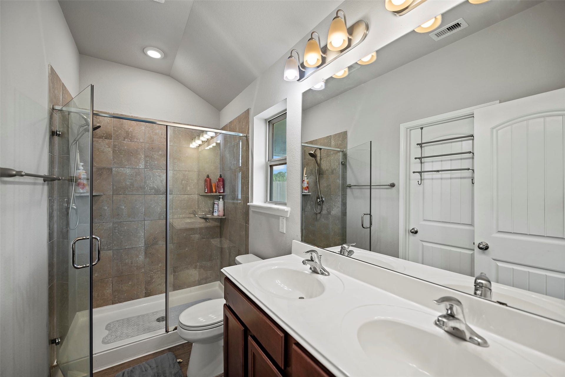 6938 Scarlet Sagebrush Street, Katy, TX 77449 Primary bathroom featuring a double vanity sink.