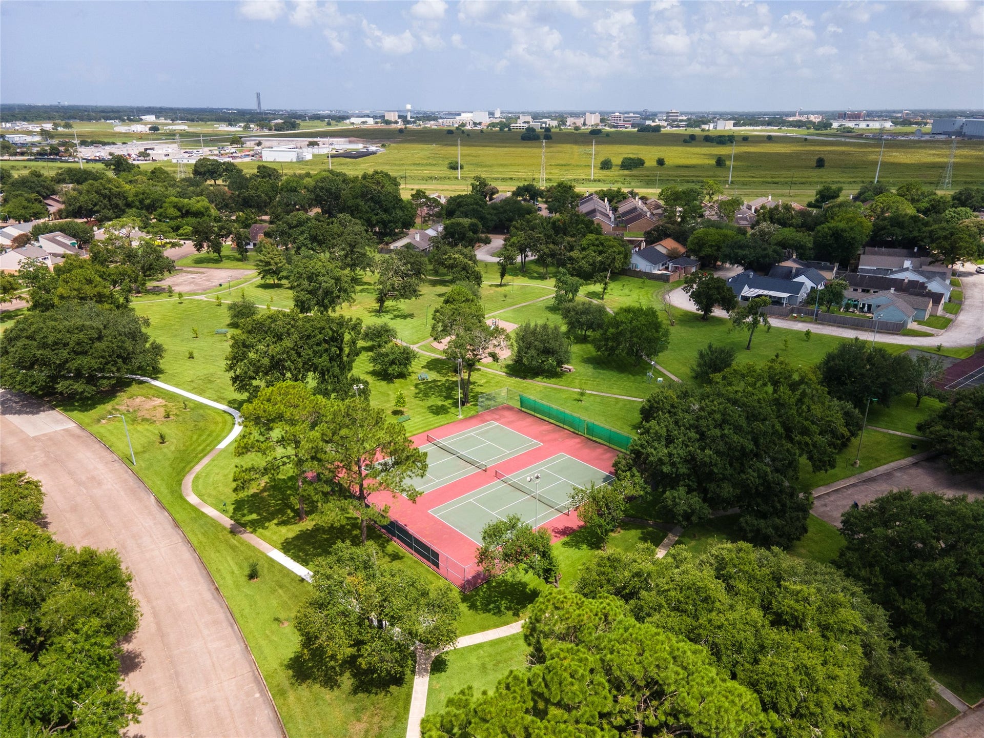 16530 Space Center Boulevard, Houston, TX 77058 Community features large park and tennis courts.