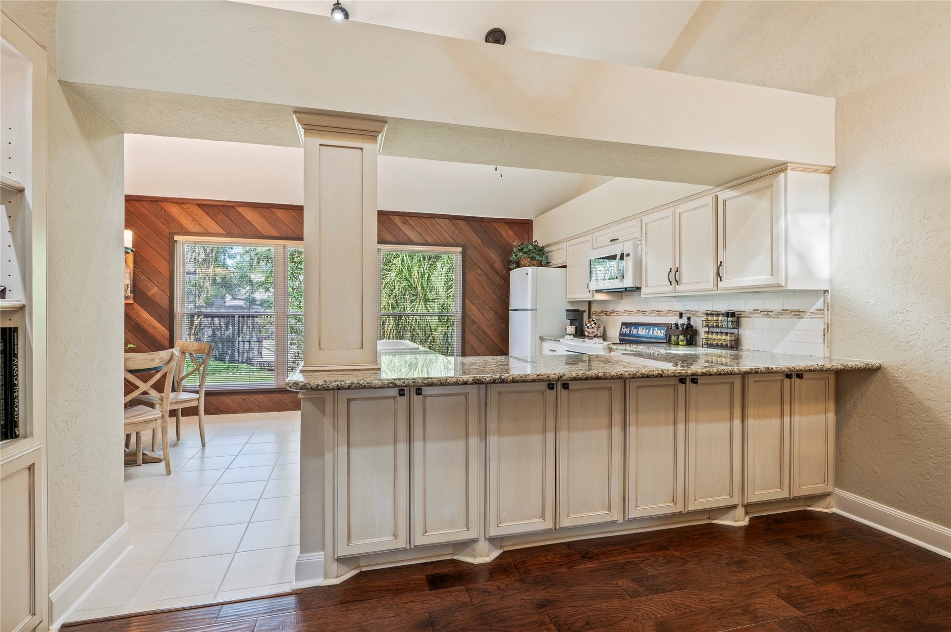 16530 Space Center Boulevard, Houston, TX 77058 Large breakfast bar with cabinet storage.
