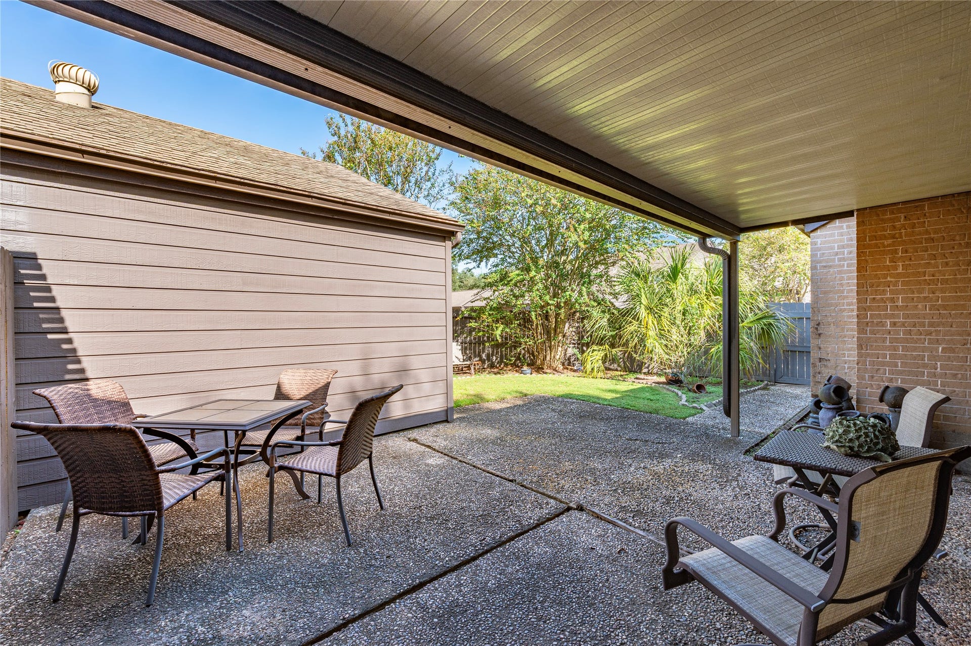 16530 Space Center Boulevard, Houston, TX 77058 Patio space looks out into the backyard space.