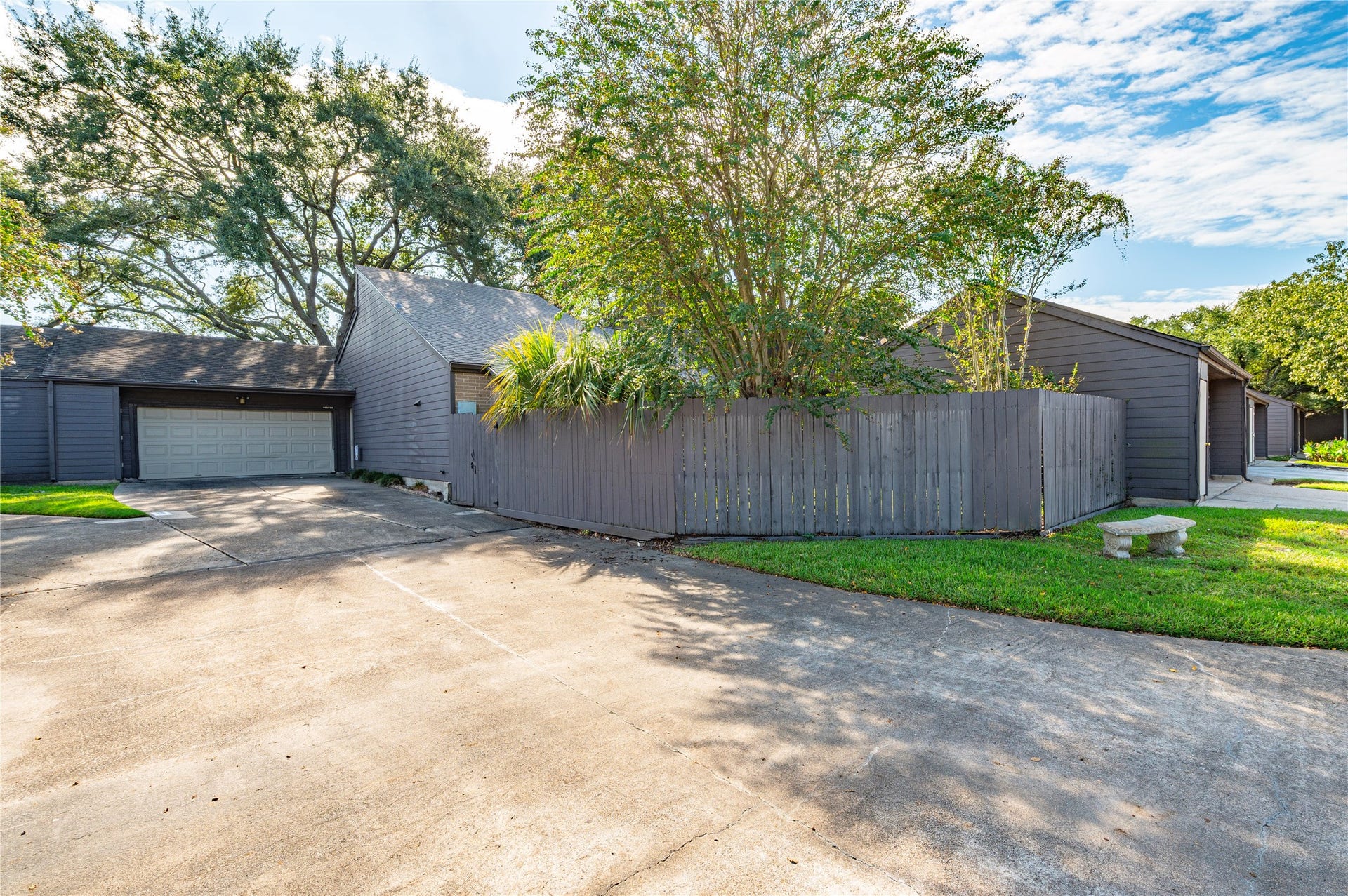 16530 Space Center Boulevard, Houston, TX 77058 Large drive for additional parking that leads to the 2 car garage.
