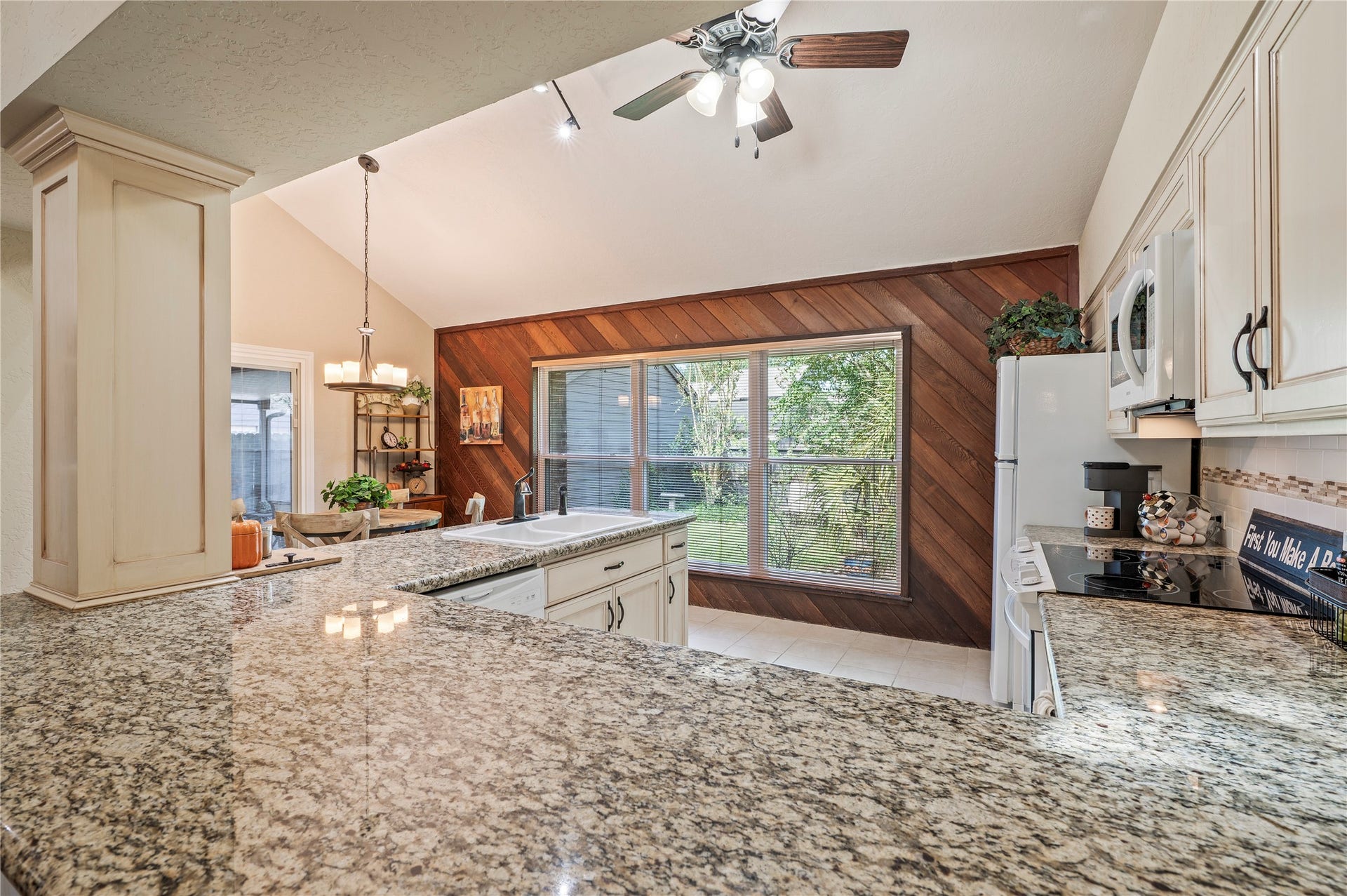 16530 Space Center Boulevard, Houston, TX 77058 Granite counter tops throughout the kitchen with tons of counter top space.