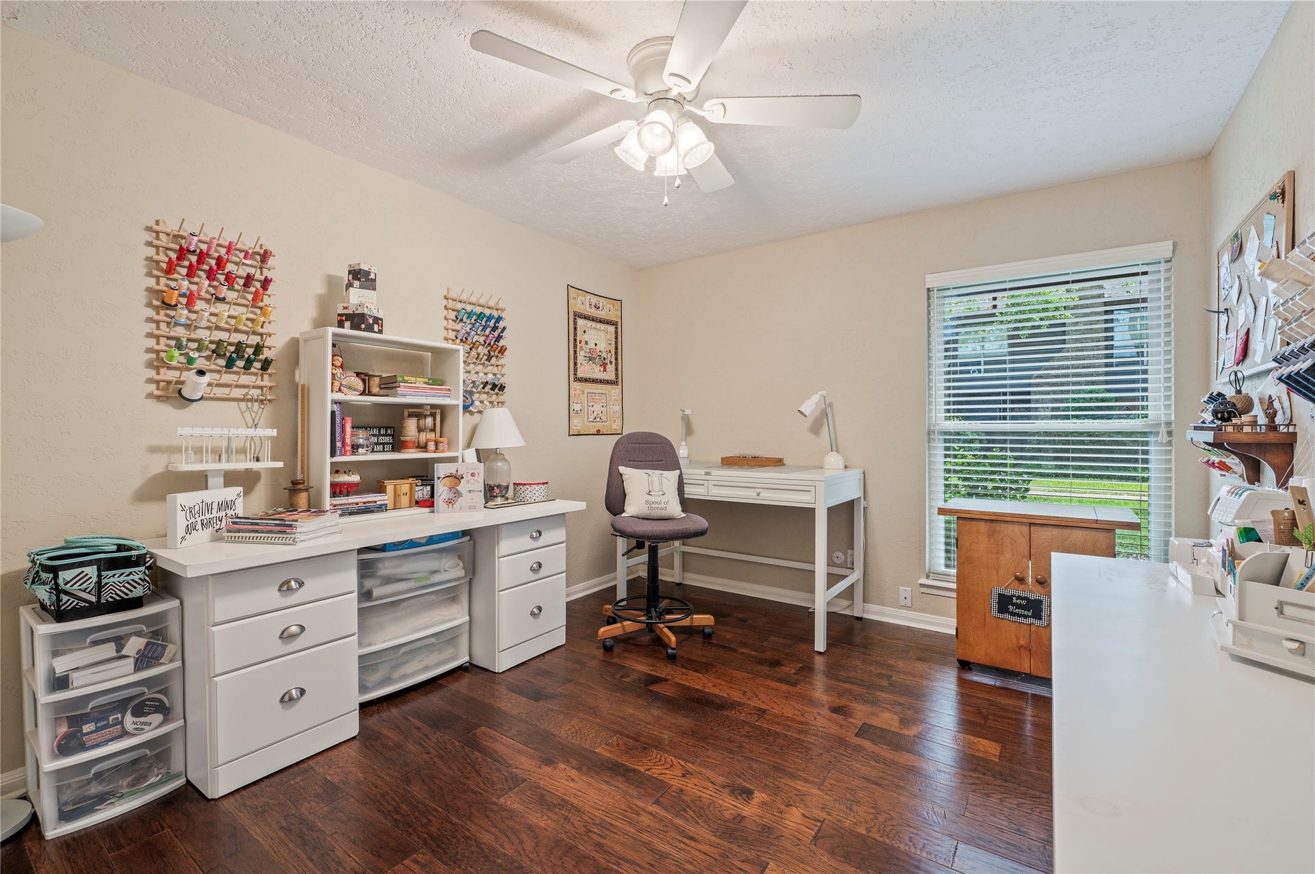 16530 Space Center Boulevard, Houston, TX 77058 Large 2nd bedroom with wood like flooring and ceiling fan fixture.
