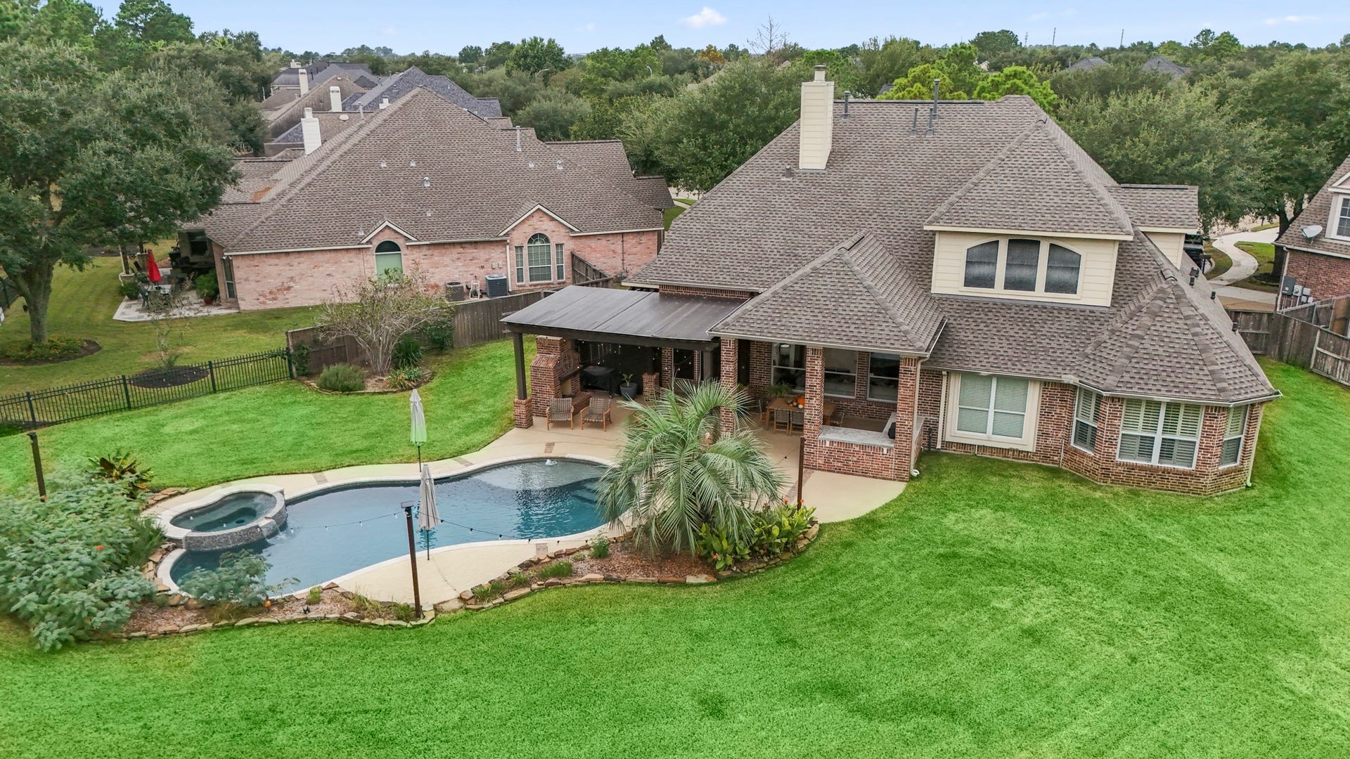 Located on nearly half an acre on the third hole of the Loch golf course, sits this beautiful private oasis with sparkling pool, raised spa, expanded decking, covered patio, extended pergola, outdoor fireplace, as well as beautiful landscaping with storage shed.