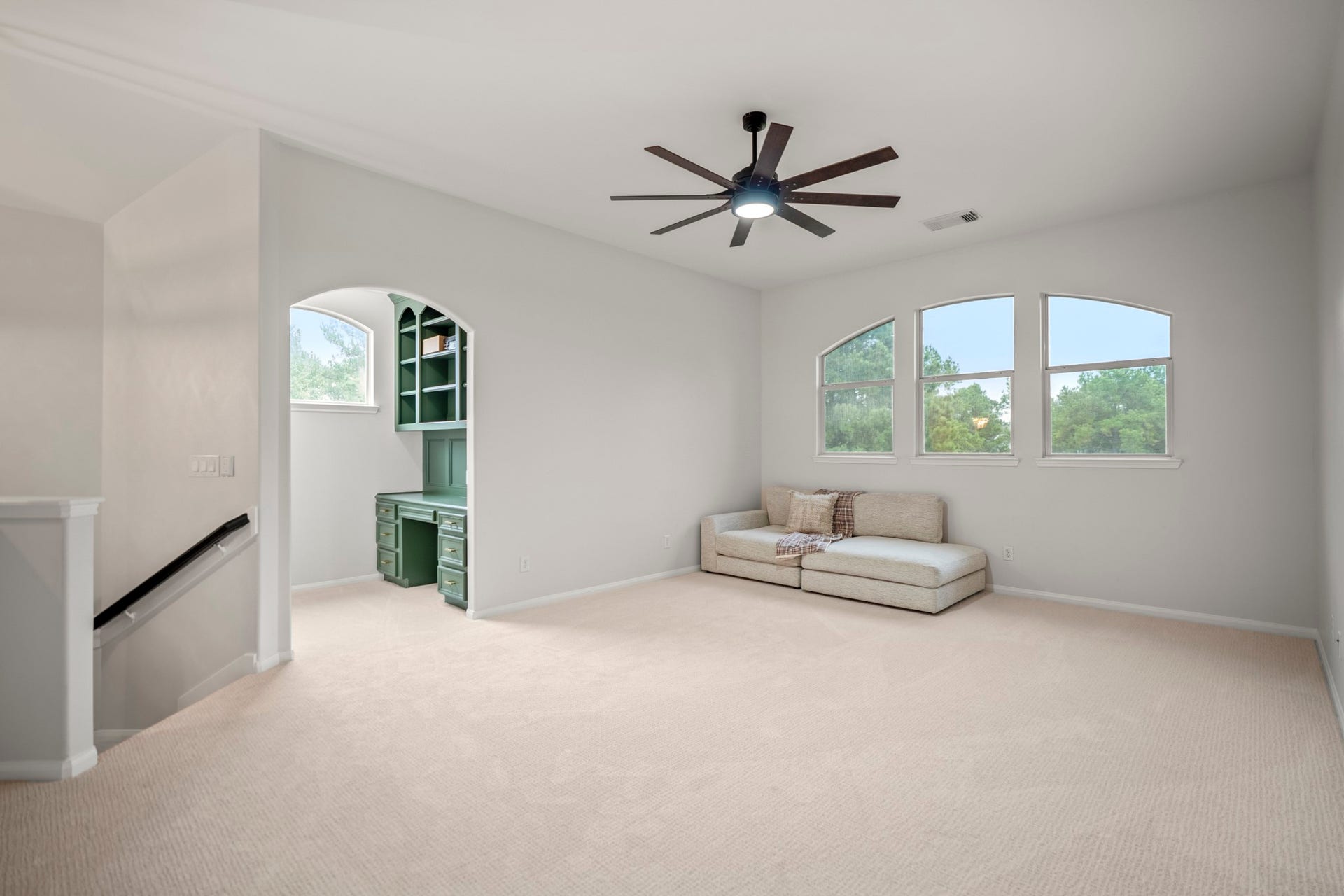 Just off the large upstairs gameroom you have an arched entry into a secondary office nook, ideal for members of your family that need an additional work space.