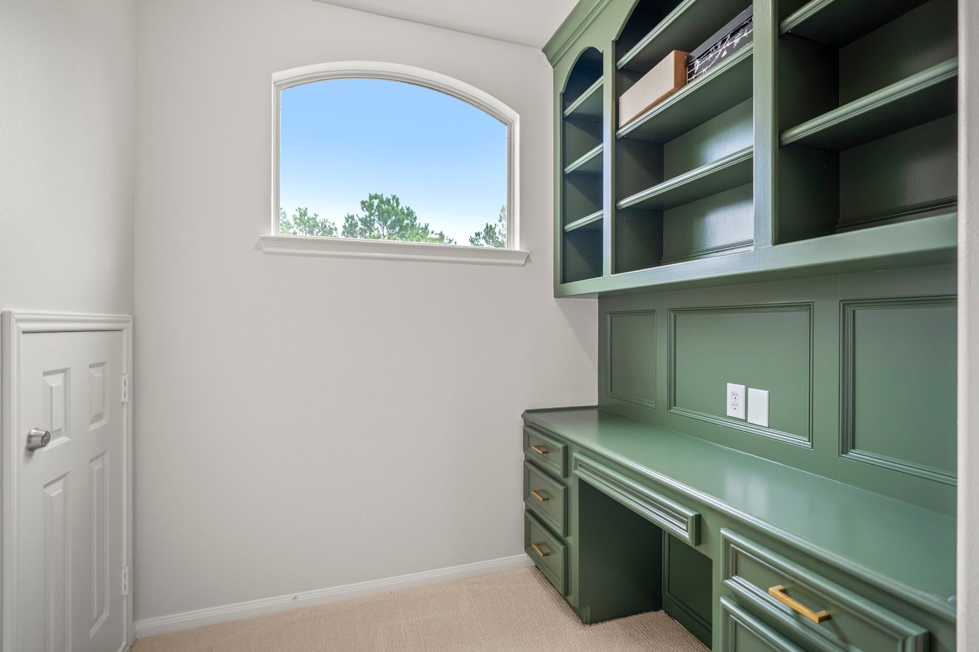 Here is a close-up view of the study nook off game room, which offer a built in desk area as well as a window that streams in natural light.