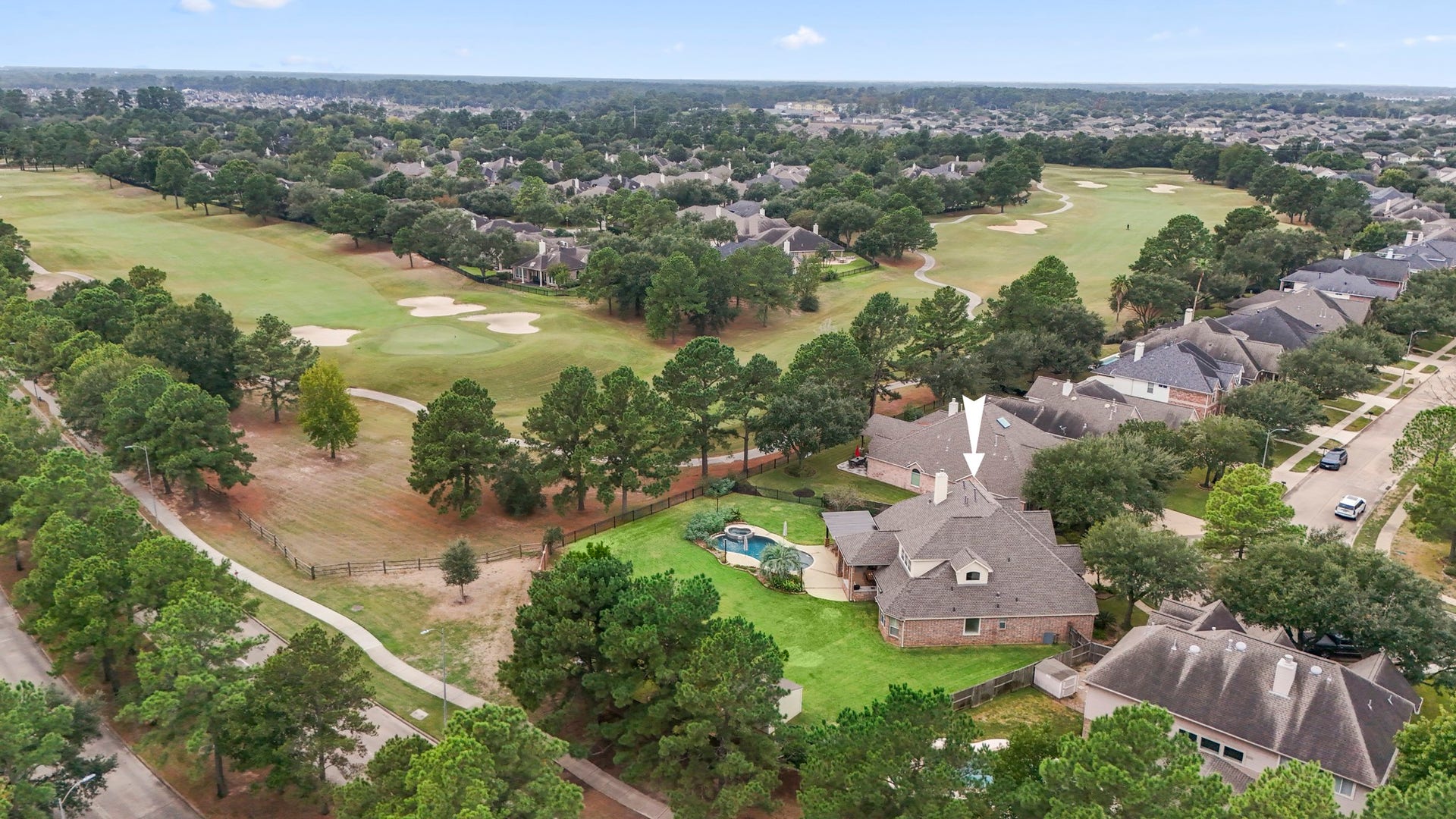 A large expansive backyard with wrought iron fence that allows you to enjoy fabulous views of Gleannloch Farms Golf Course.