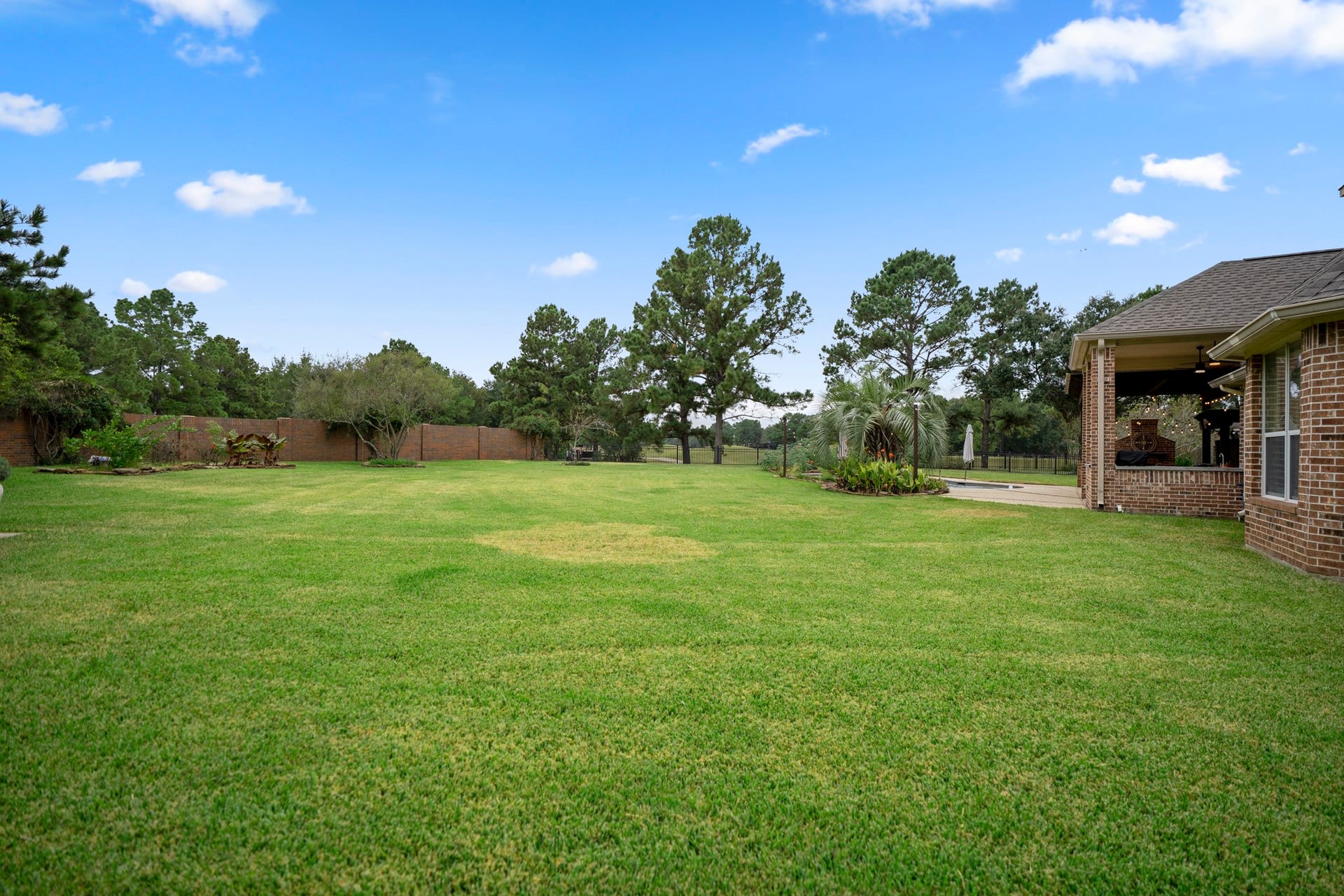 The generous lawn area offers hours of fun outdoors, while the yard has plenty of room for kids and dogs to play it also features a custom-built shed on slab. The home has a NEW Roof & New AC 2026. Epoxy Floors in garage with overhead garage storage system.