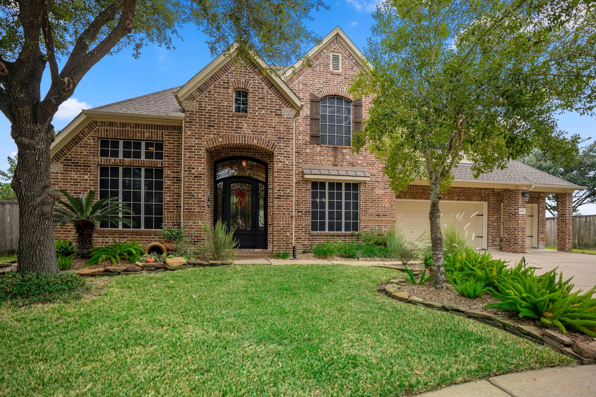 This beautiful home has a refined interior & impressively updated, low maintenance brick elevation, stunning wrought iron doors welcome you home.