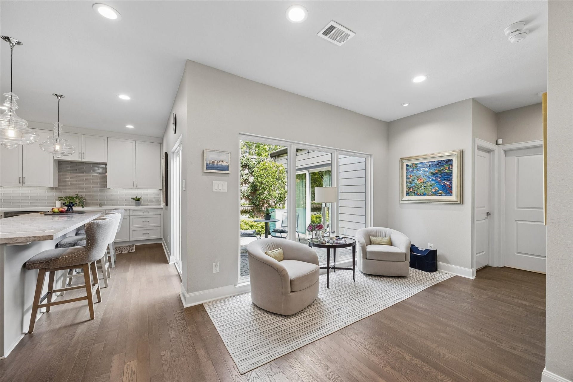 SUN ROOM AREA: This peaceful space with views to the atrium is the perfect spot for your morning coffee and a good book.