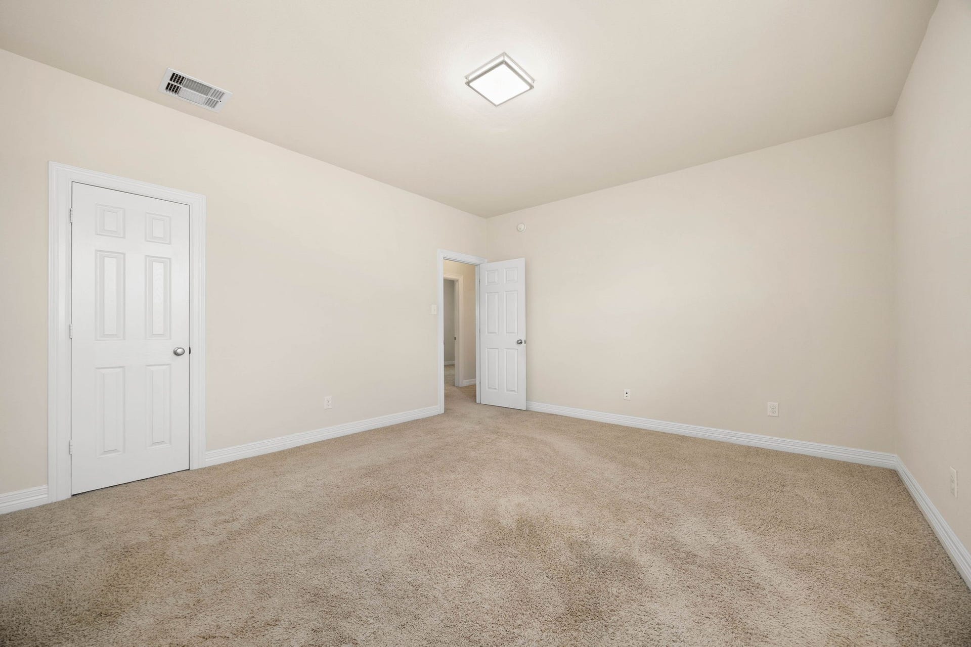 26306 Sunny Springs Lane, Cypress, TX 77433 This generously sized bedroom is one of three secondary bedrooms with spacious walk-in closets which are off one side of the game room from the second primary suite.