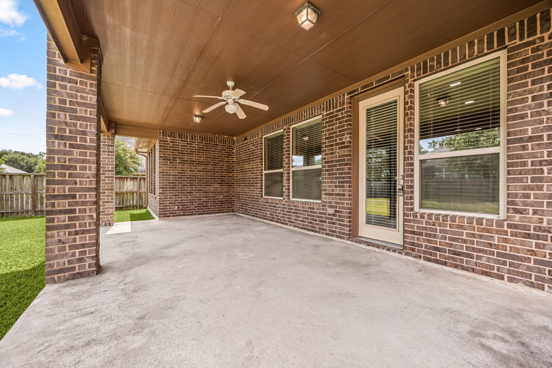 26306 Sunny Springs Lane, Cypress, TX 77433 The oversized covered patio downstairs is ready for your grill!